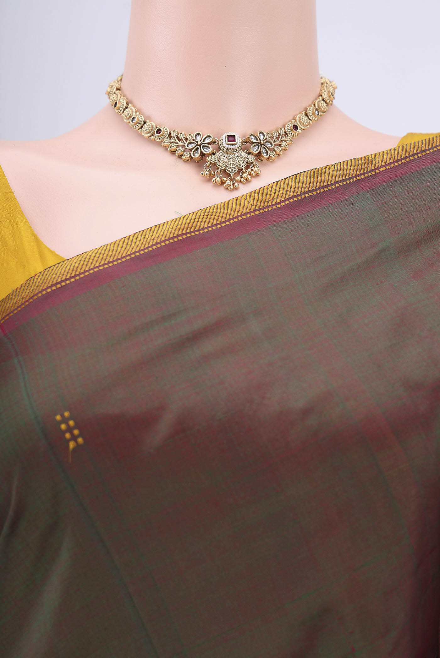 Border image of Green Kanchipuram Silk Saree with Plain Body and Thread Border. 
