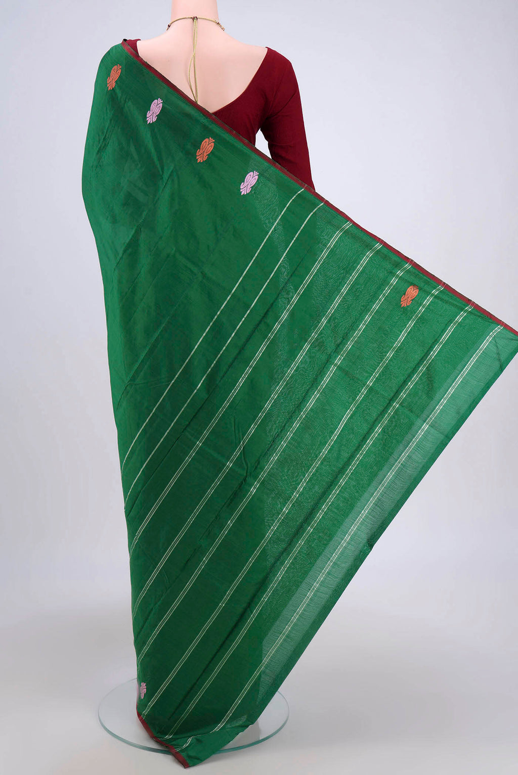 Flat view of Bottle Green Kanchipuram Saree with Plain Body and Thread Border. 