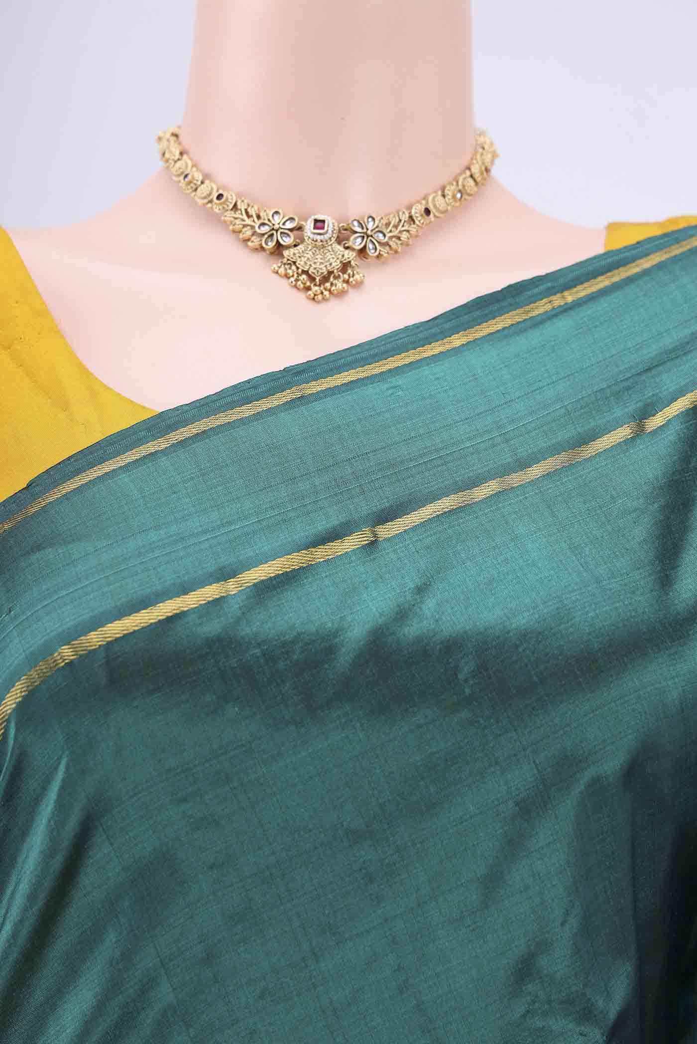 Border image of Green Kanchipuram Saree with Plain Body and Zari And Thread Border. 