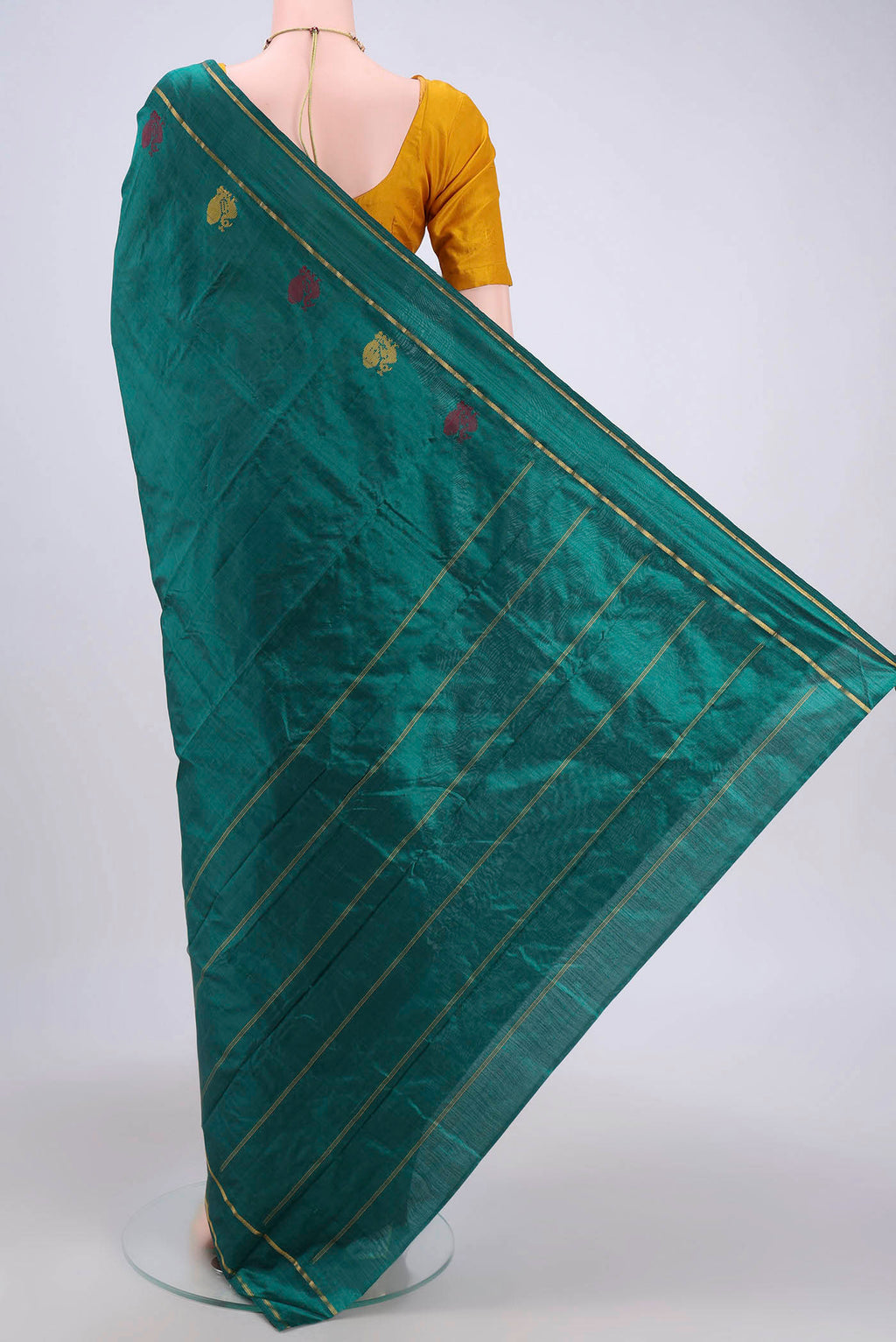 Flat view of Green Kanchipuram Saree with Plain Body and Zari And Thread Border. 