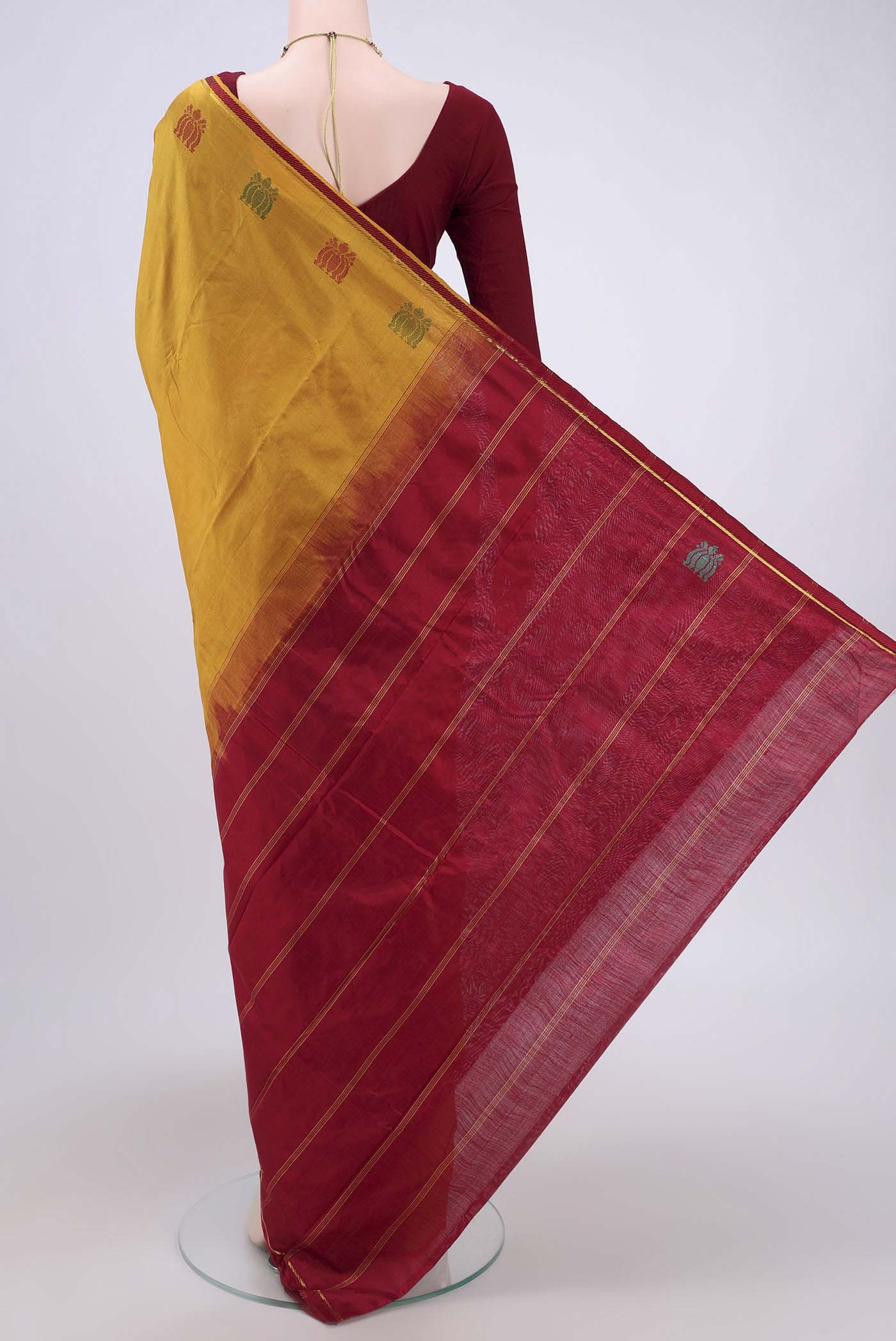 Flat view of Mustard Kanchipuram Saree with Plain Body and Zari And Thread Border. 