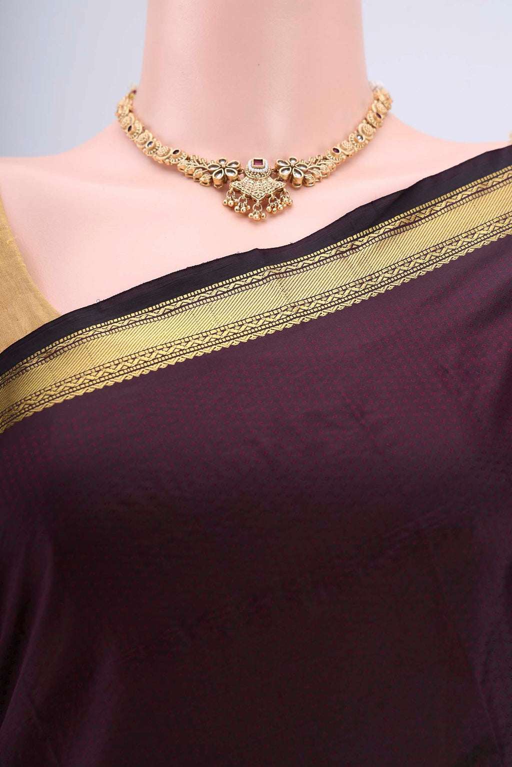 Border image of Coffee Brown Blended Bangalore Silk Saree with Zari Butta on the body and Zari Border. 