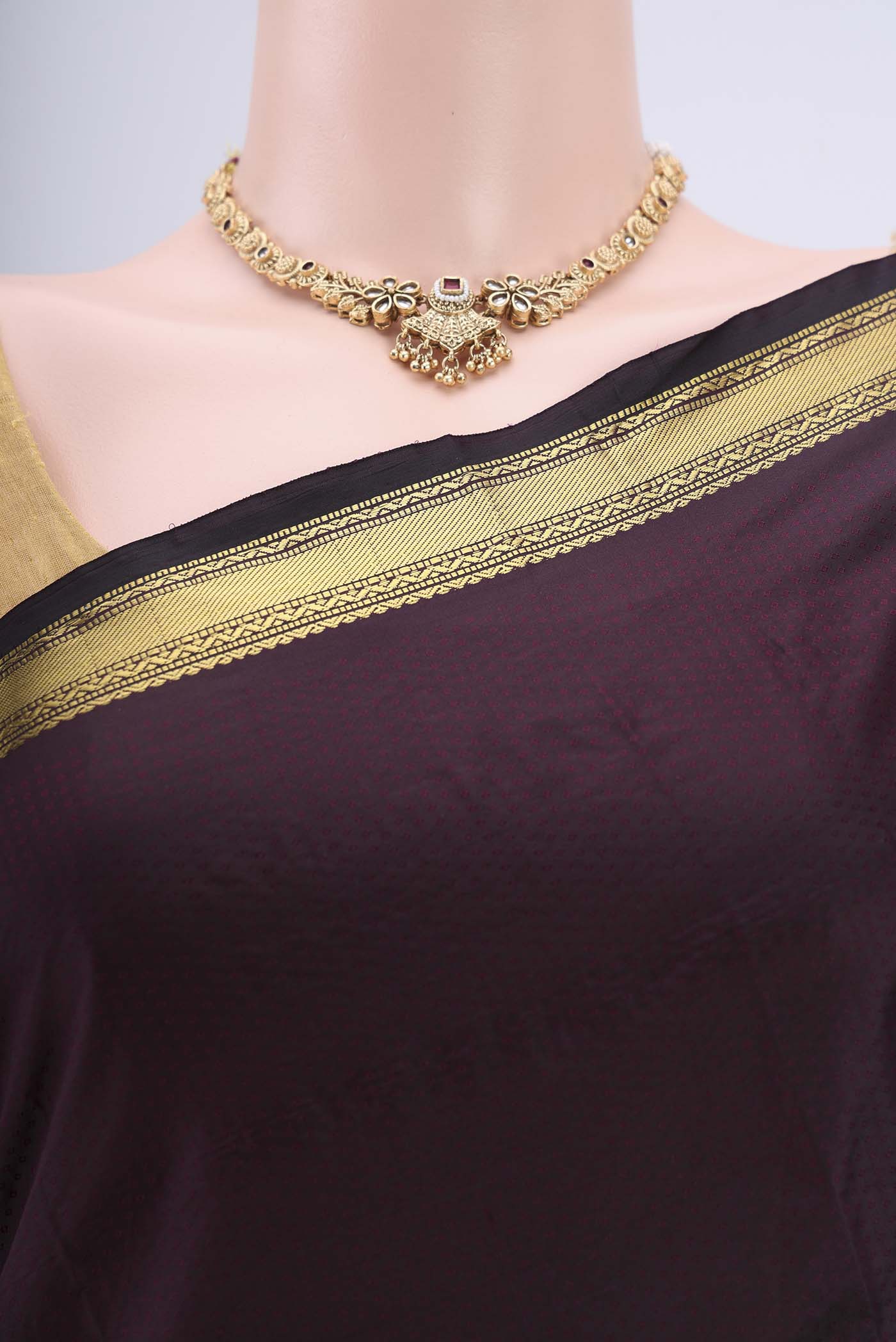 Border image of Coffee Brown Blended Bangalore Silk Saree with Zari Butta on the body and Zari Border. 