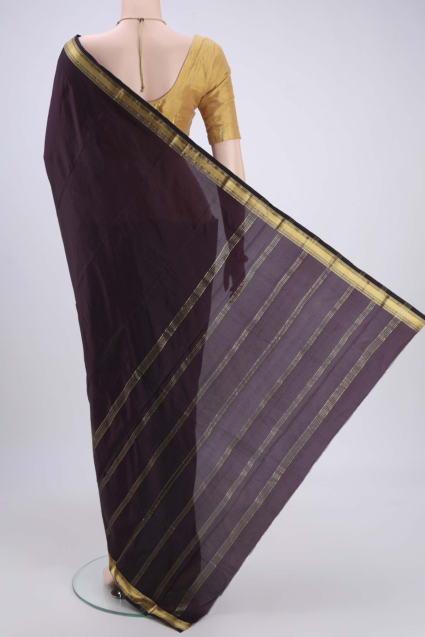 Flat view of Coffee Brown Blended Bangalore Silk Saree with Zari Butta on the body and Zari Border. 