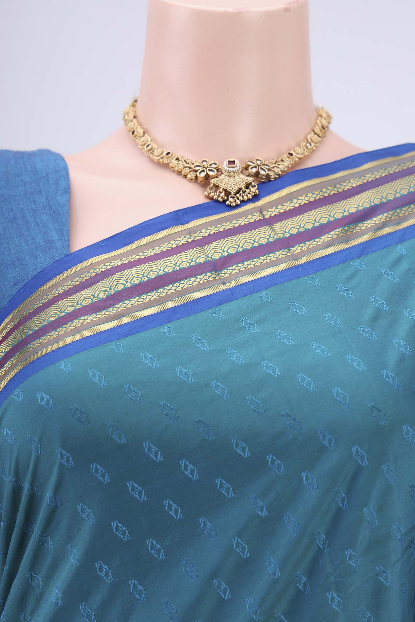 Border image of Turquoise Blended Bangalore Silk Saree with Zari Butta on the body and Zari Border. 