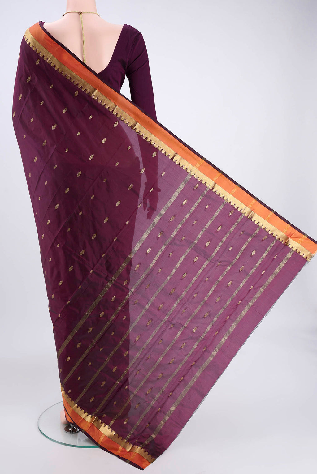 Flat view of Magenta Blended Bangalore Silk Saree with Zari Butta on the body and Zari Border. 