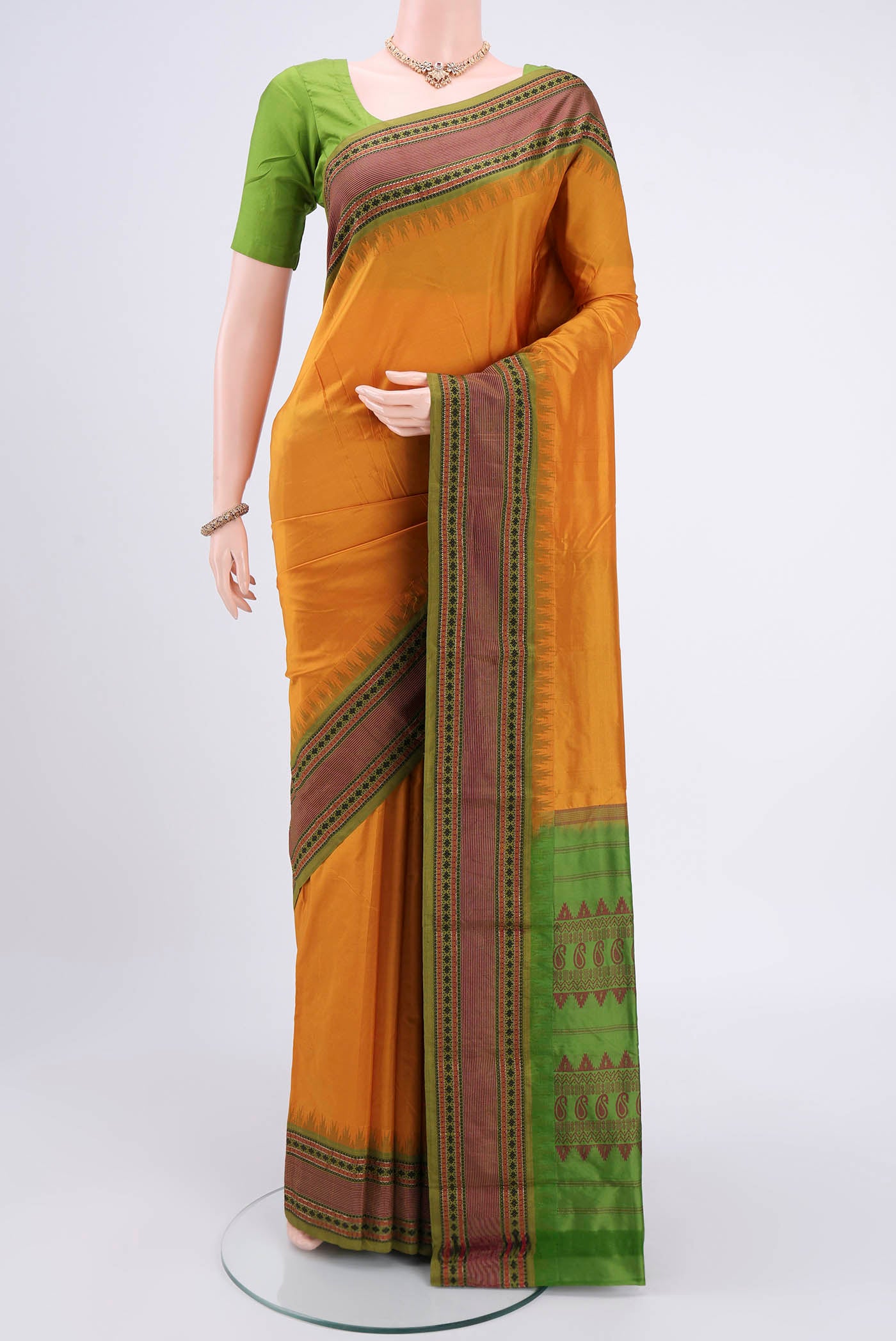 Mustard Bangalore Silk - kadyal Saree with Plain Body and Thread Border.  displayed on a mannequin