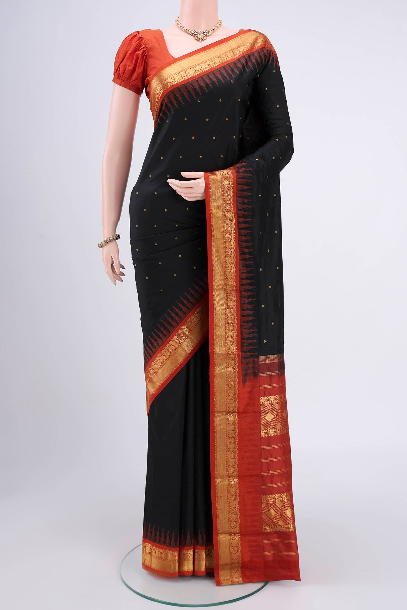 Black Bangalore Silk - kadyal Saree with Zari Butta on the body and Zari Border.  displayed on a mannequin