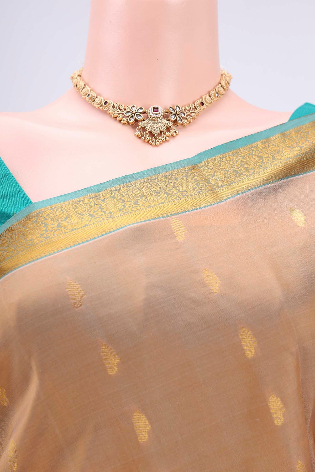 Border image of Beige Kanjivaram Silk Saree with Zari Butta on the body and Zari Border. 