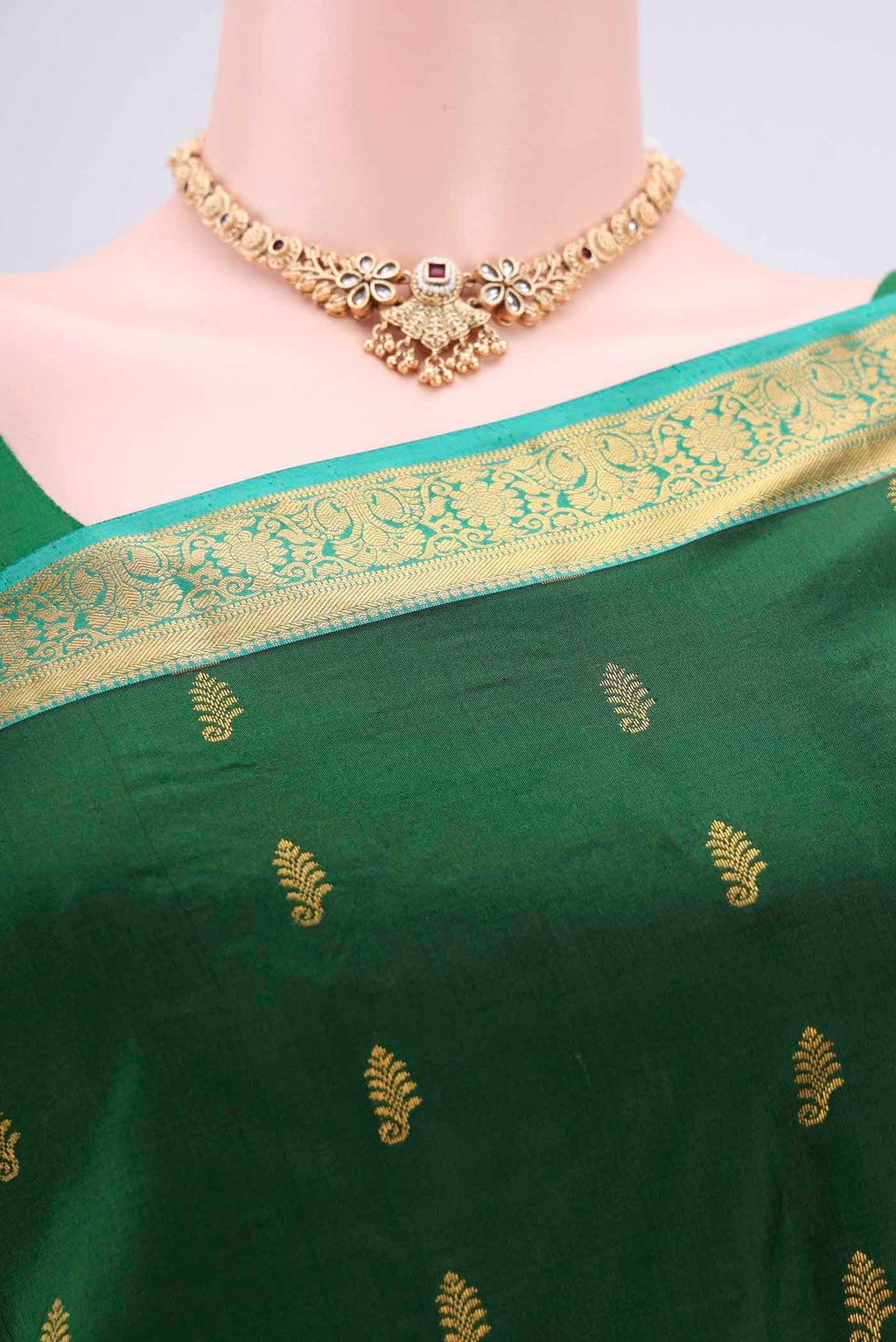 Border image of Bottle Green Kanjivaram Silk Saree with Zari Butta on the body and Zari Border. 