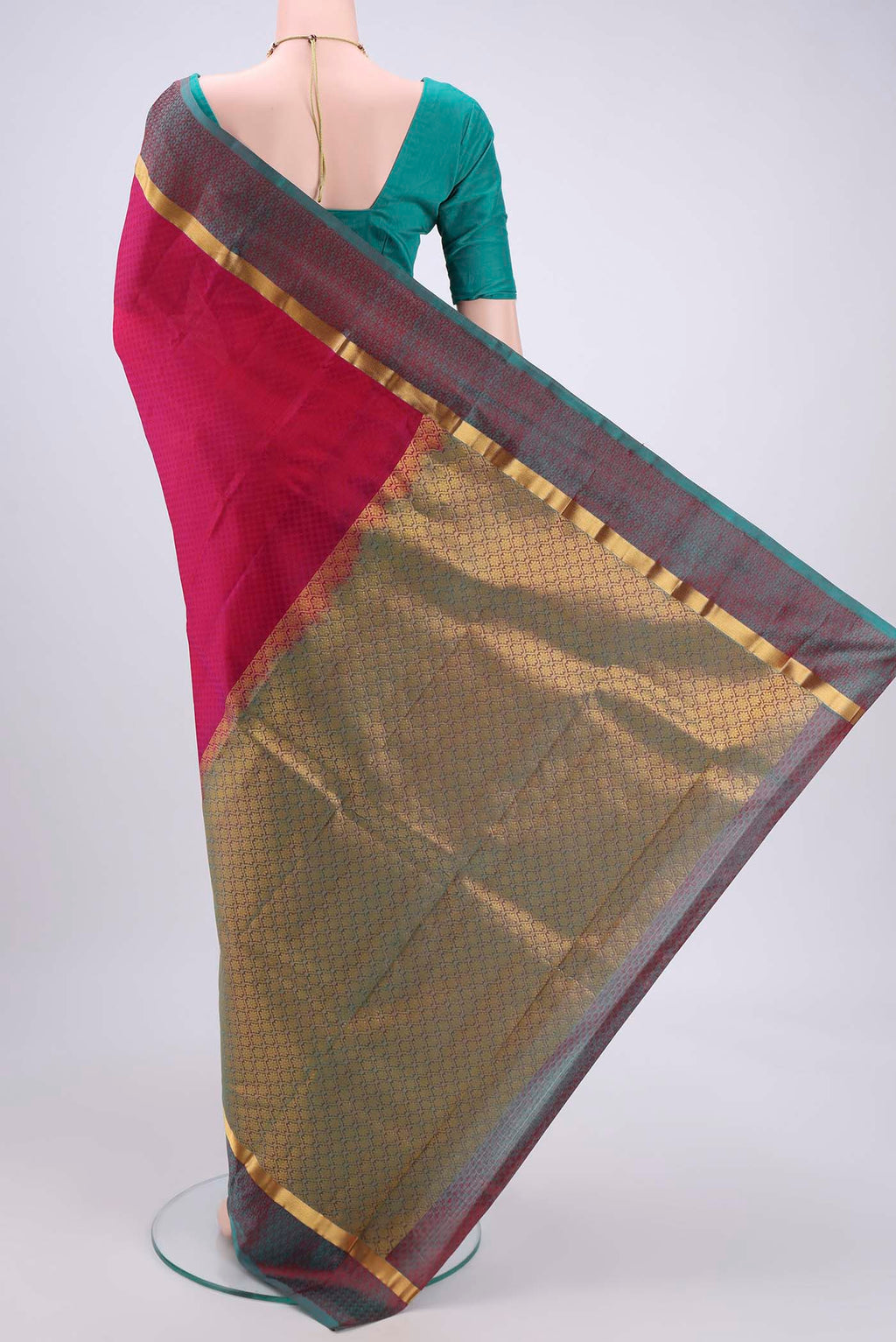 Flat view of Pink Kanjivaram Silk Saree with Zari Butta on the body and Zari Border. 