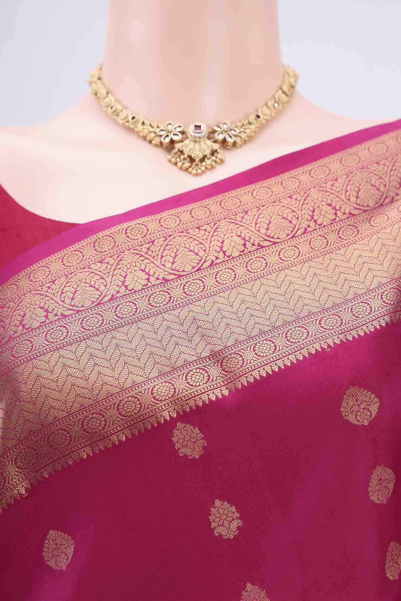 Border image of Pink Kanchipuram Silk Saree with Zari Butta on the body and Zari Border. 