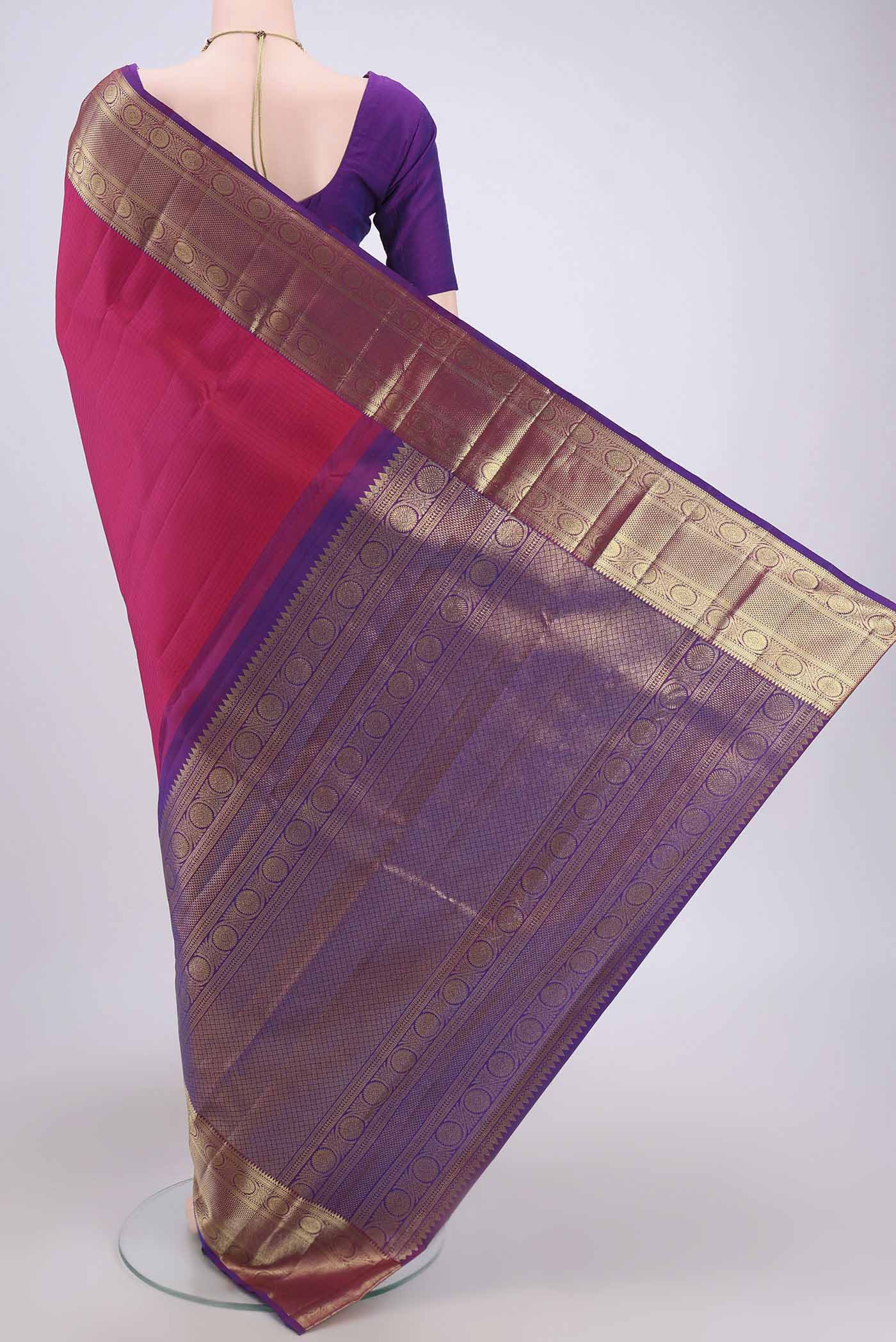 Flat view of Dark Pink Kanjivaram Saree with Checked design on the body and Zari Border. 