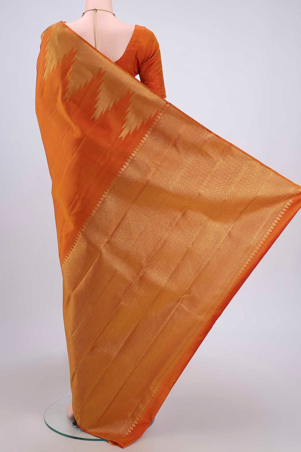Flat view of Mustard Dual Tone Soft Silk Saree with Jacquard design on the body and Temple Border. 