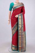 Maroon Kanjivaram Saree with Checked design on the body and Zari Border.  displayed on a mannequin