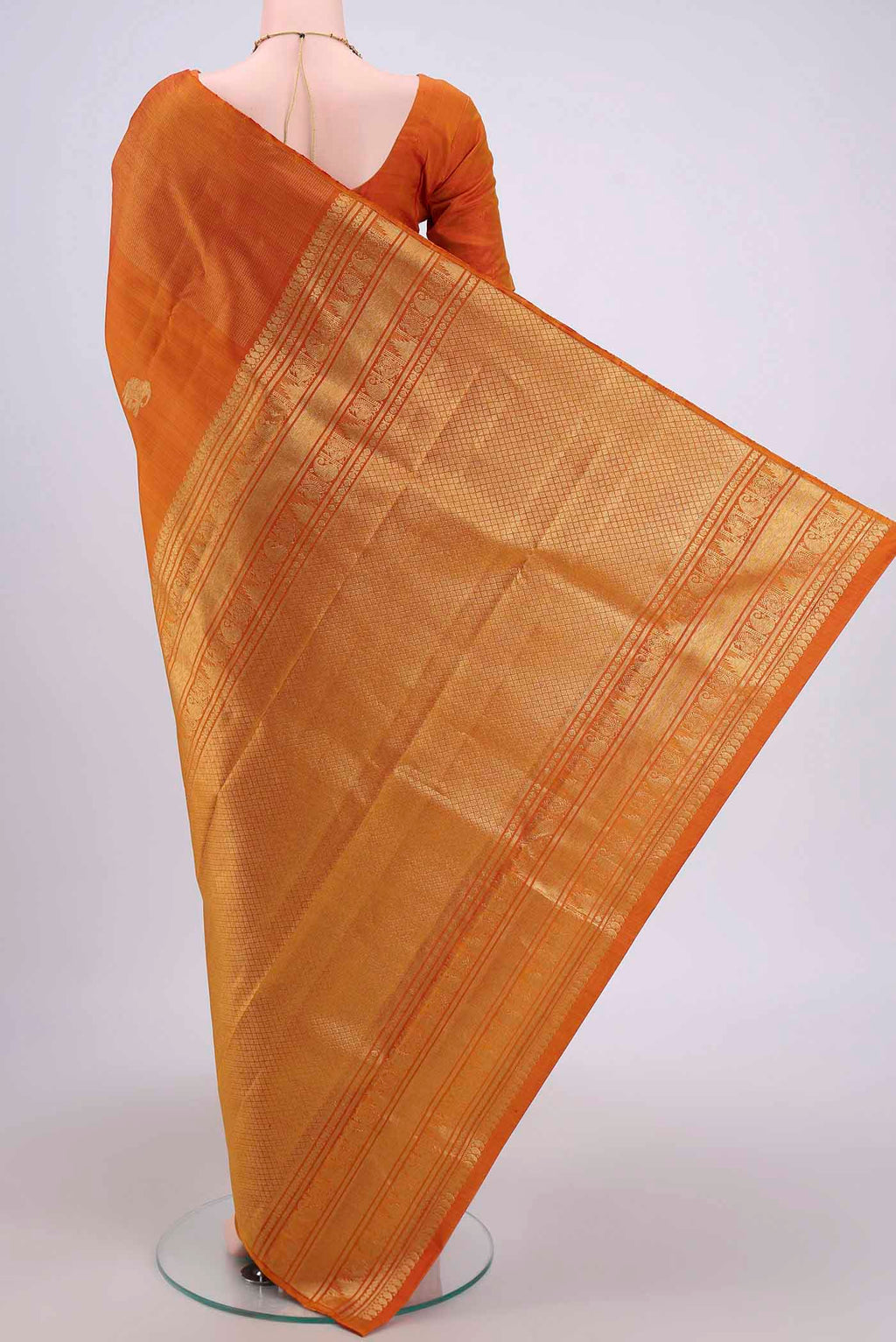 Flat view of Mustard Dual Tone Kanjivaram Silk Saree with Zari Butta on the body and Zari Border. 