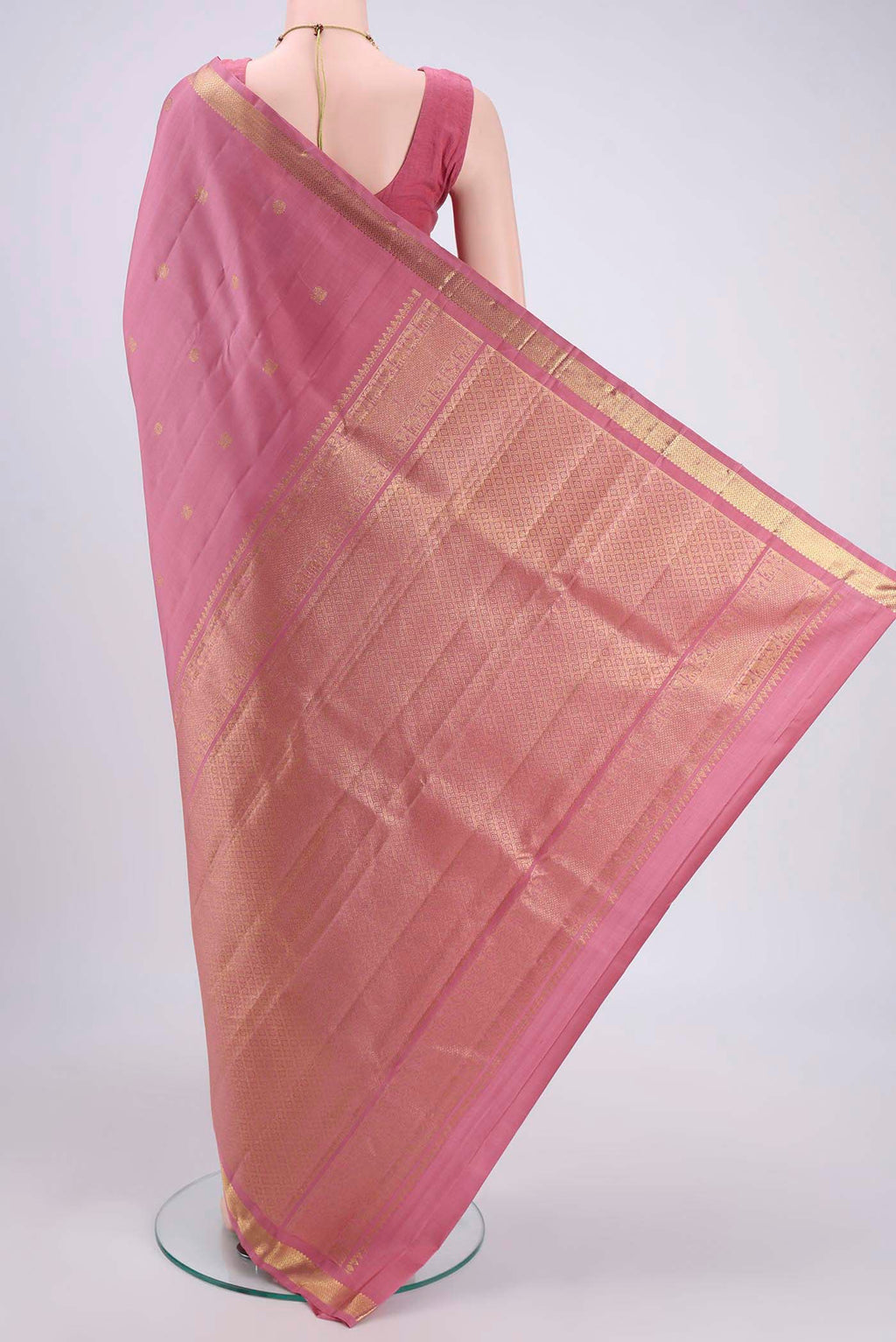 Flat view of Rose pink Nangavalli Silk [ Salem ] Saree with Zari Butta on the body and Zari Border. 