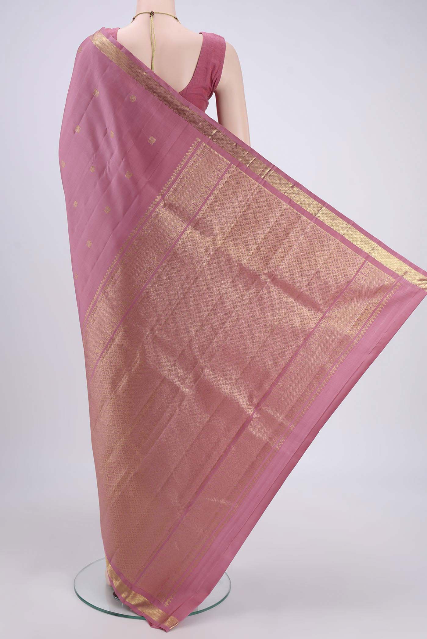 Flat view of Rose pink Nangavalli Silk [ Salem ] Saree with Zari Butta on the body and Zari Border. 