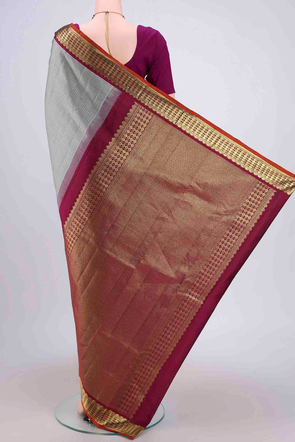 Flat view of Grey Dual Tone Kanchipuram Saree with Checked design on the body and Zari Border. 
