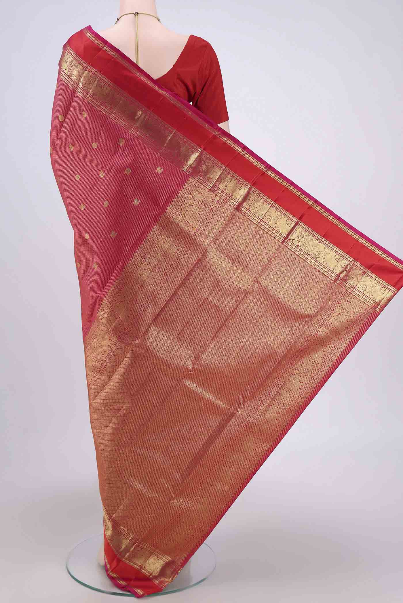 Flat view of Dark Pink Dual Tone Kanjivaram Saree with Checked design on the body and Zari Border. 