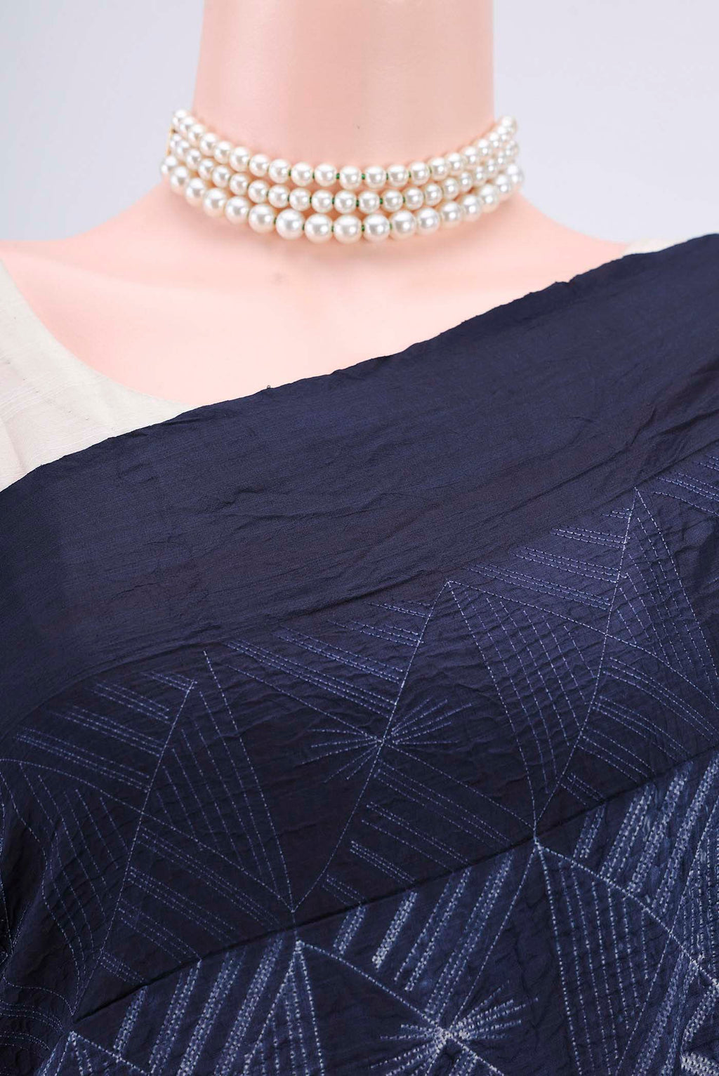 Border image of Navy Blue Printed Silk Saree with Printed design on the body and Plain Border. 