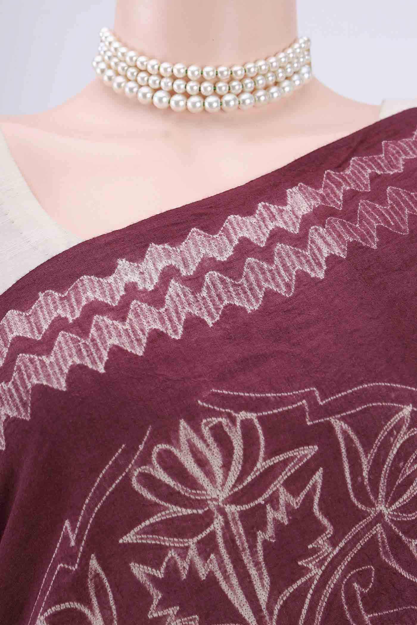 Border image of Maroon Printed Silk Saree with Printed design on the body and Plain Border. 