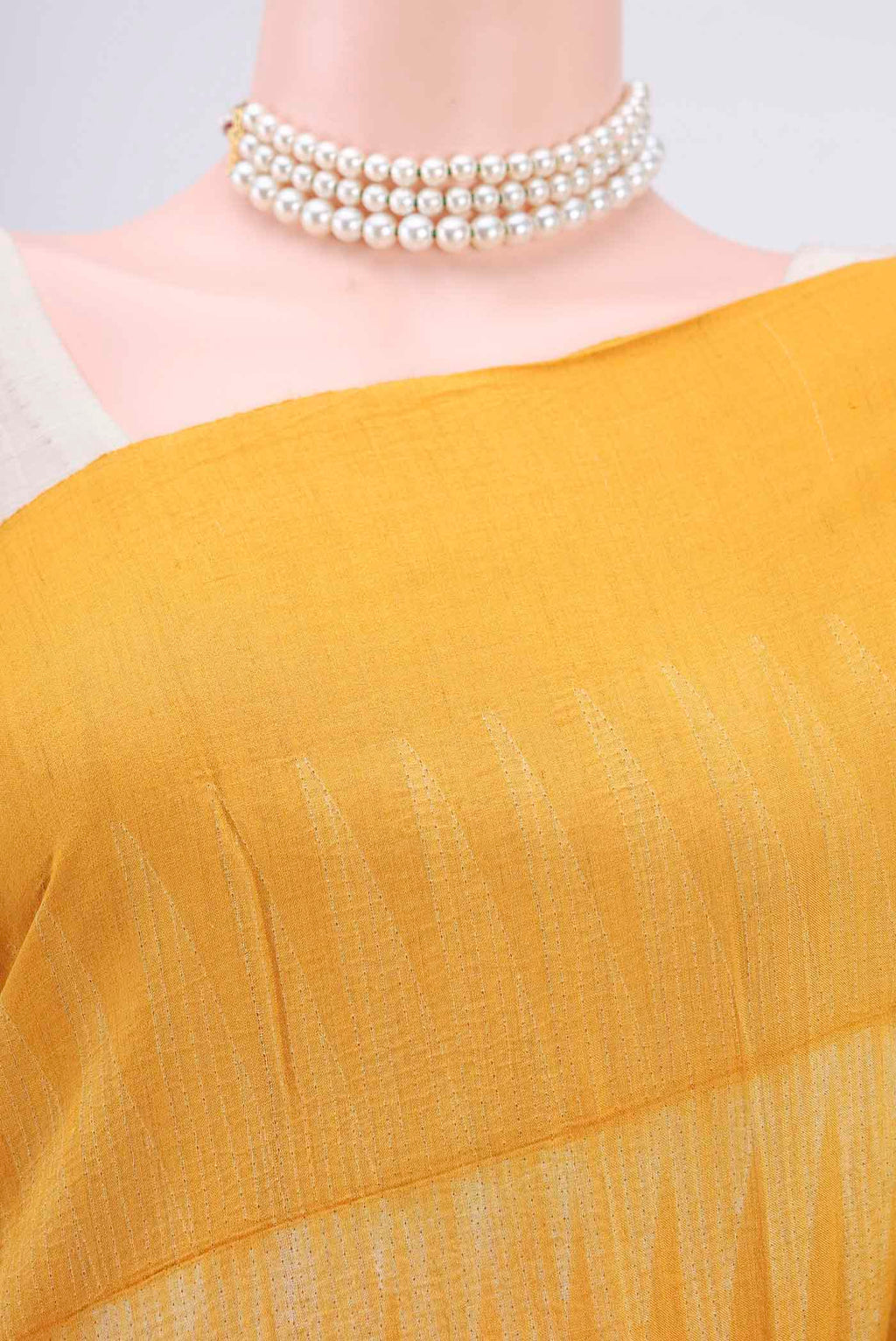 Border image of Mustard Printed Silk Saree with Printed design on the body and Plain Border. 