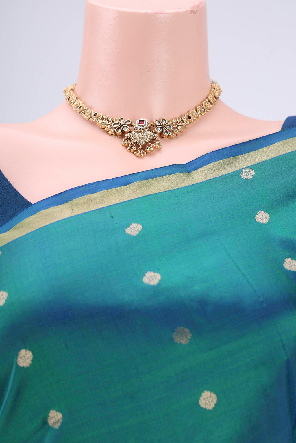 Border image of Turquoise Banarasi Katan Silk Saree with Zari Butta on the body and Zari Border. 