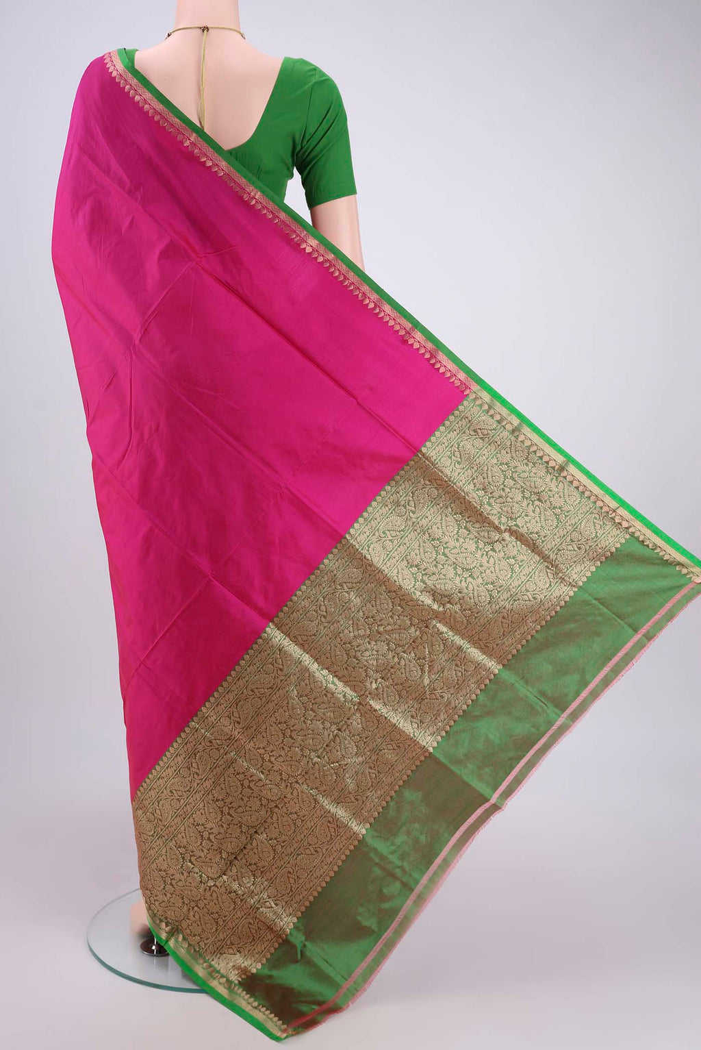 Flat view of Pink Banarasi Katan Silk Saree with Zari Butta on the body and Zari Border. 