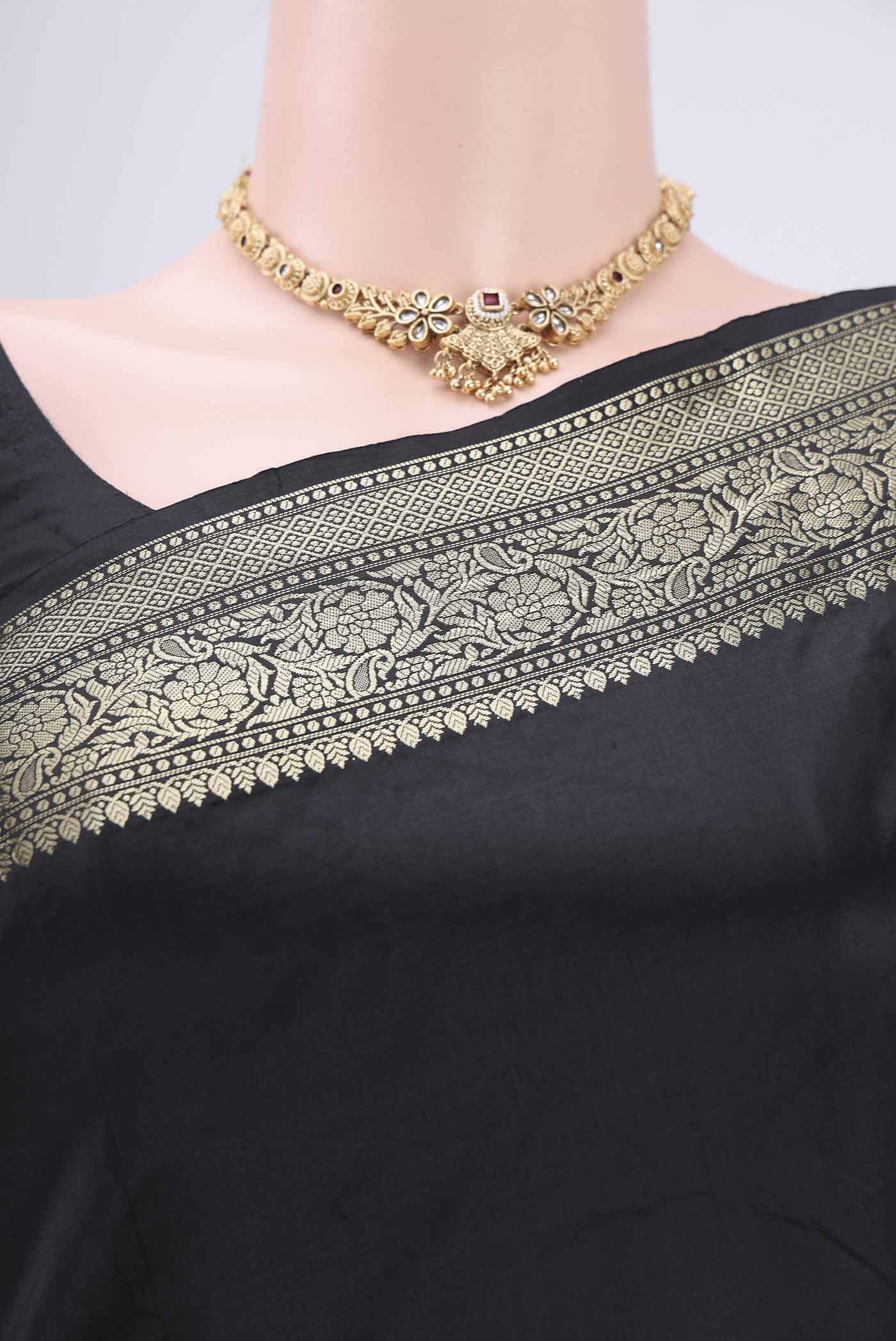 Border image of Black Banarasi Katan Silk Saree with Zari Butta on the body and Zari Border. 