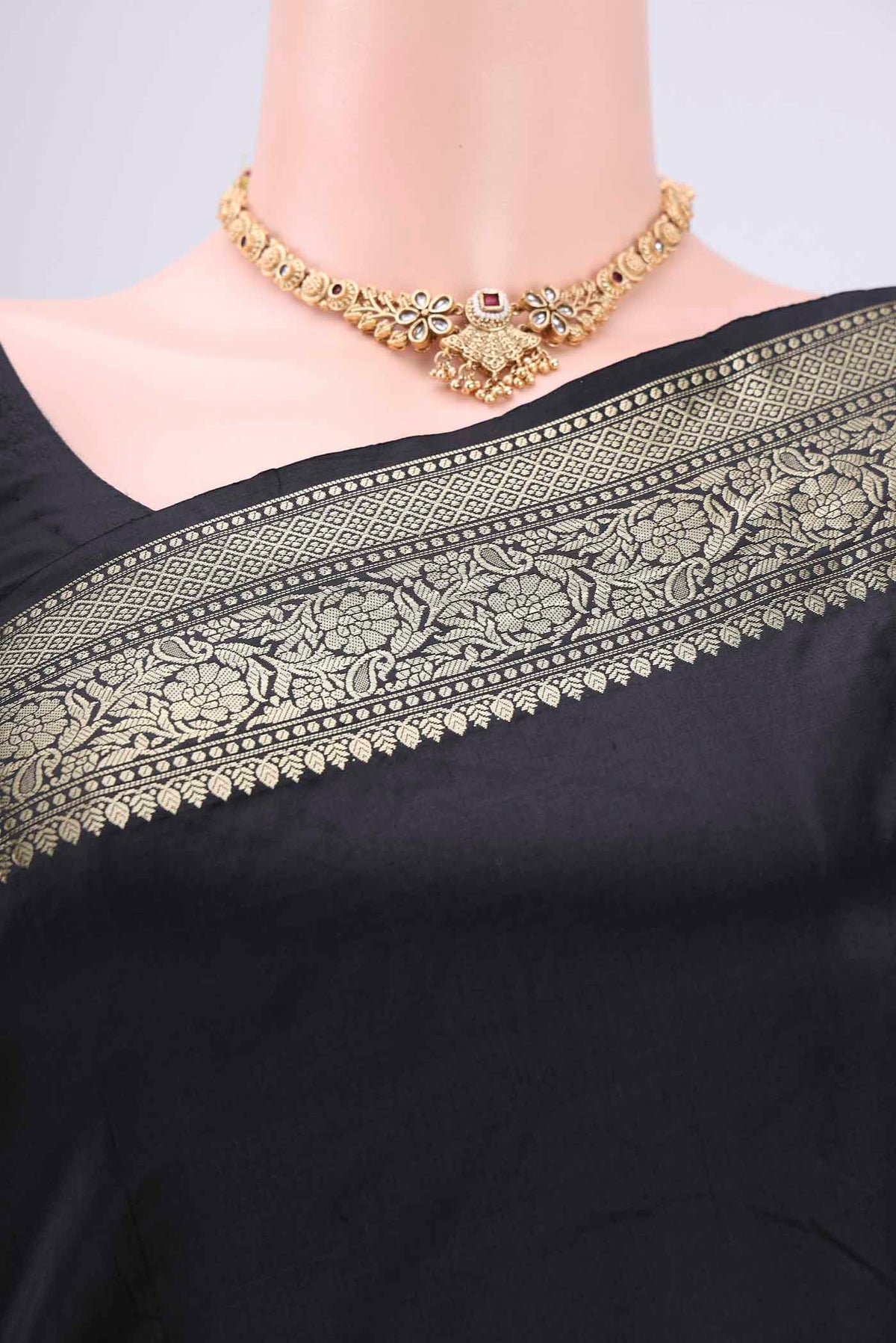 Border image of Black Banarasi Katan Silk Saree with Zari Butta on the body and Zari Border. 