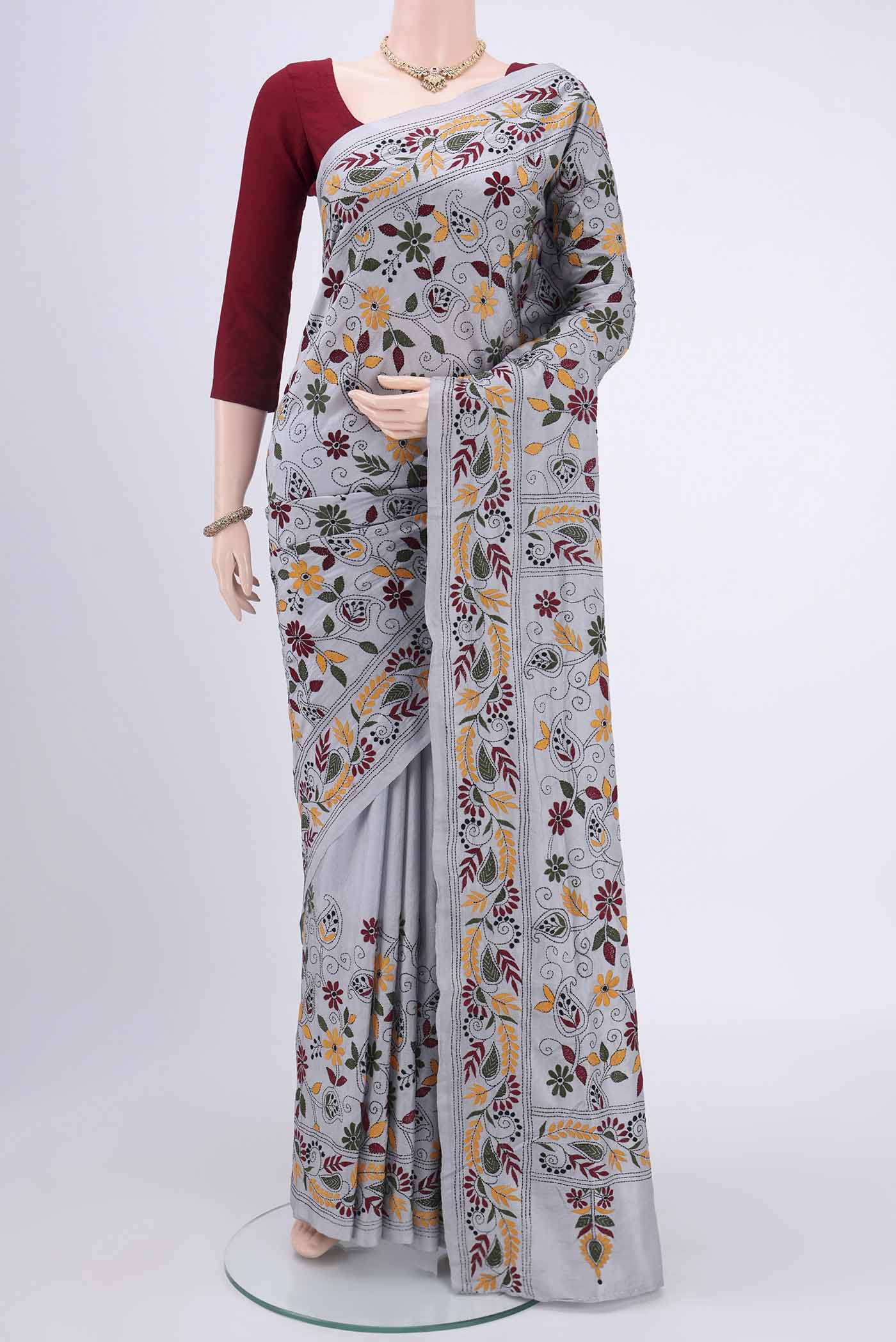 Grey Kantha Silk Saree with Kantha Work on the body and Thread Border.  displayed on a mannequin