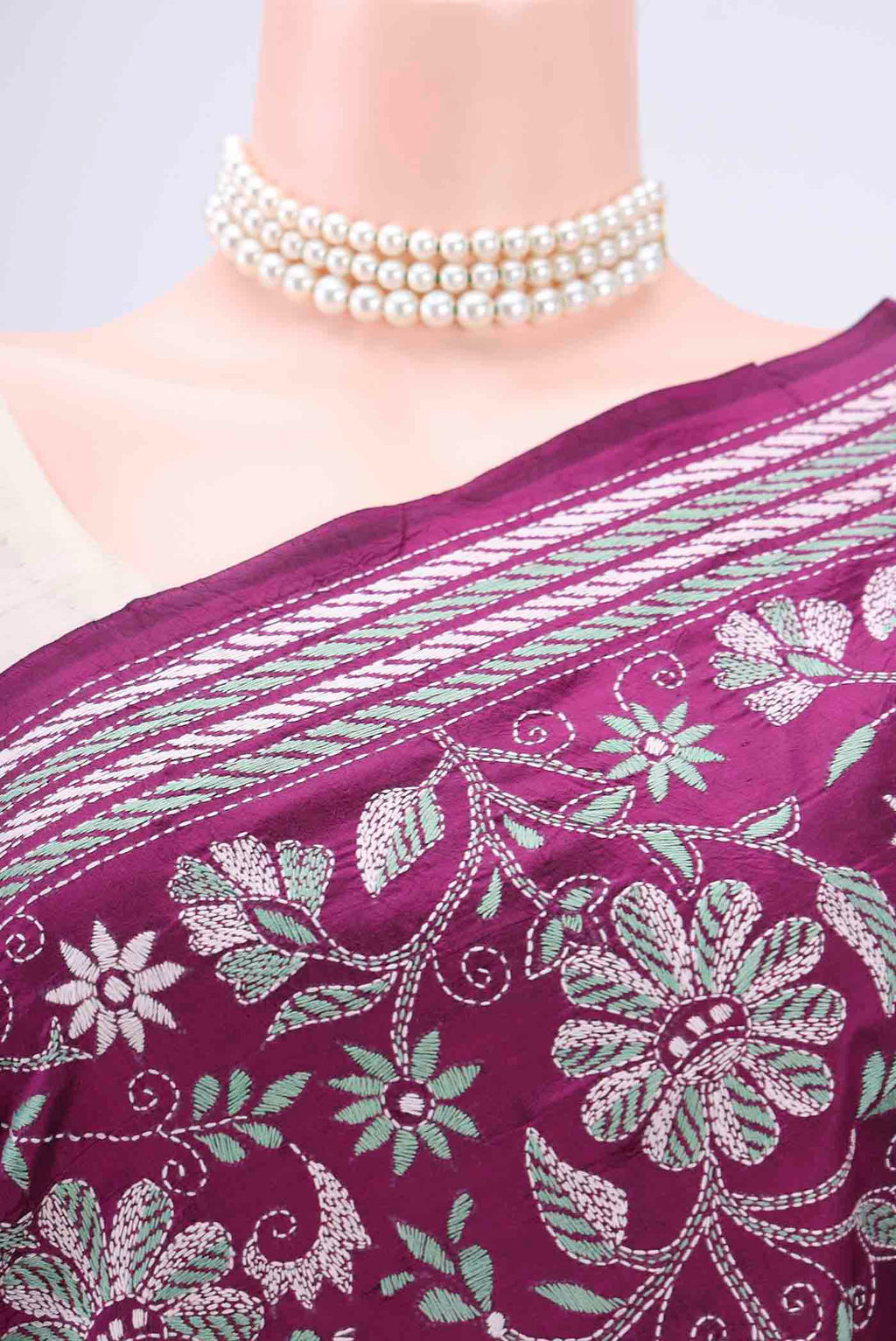 Border image of Magenta Kantha Silk Saree with Kantha Work on the body and Thread Border. 