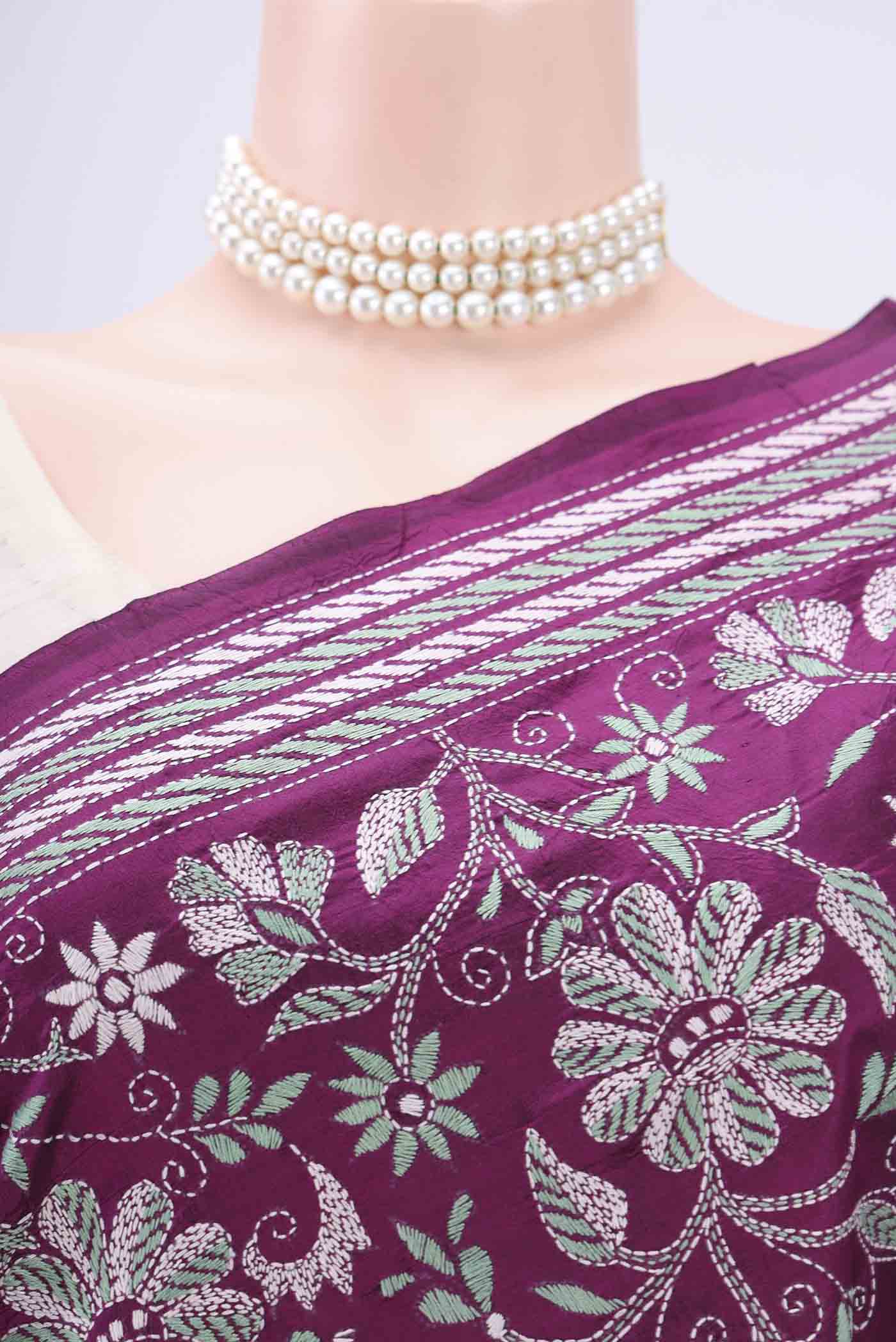 Border image of Magenta Kantha Silk Saree with Kantha Work on the body and Thread Border. 