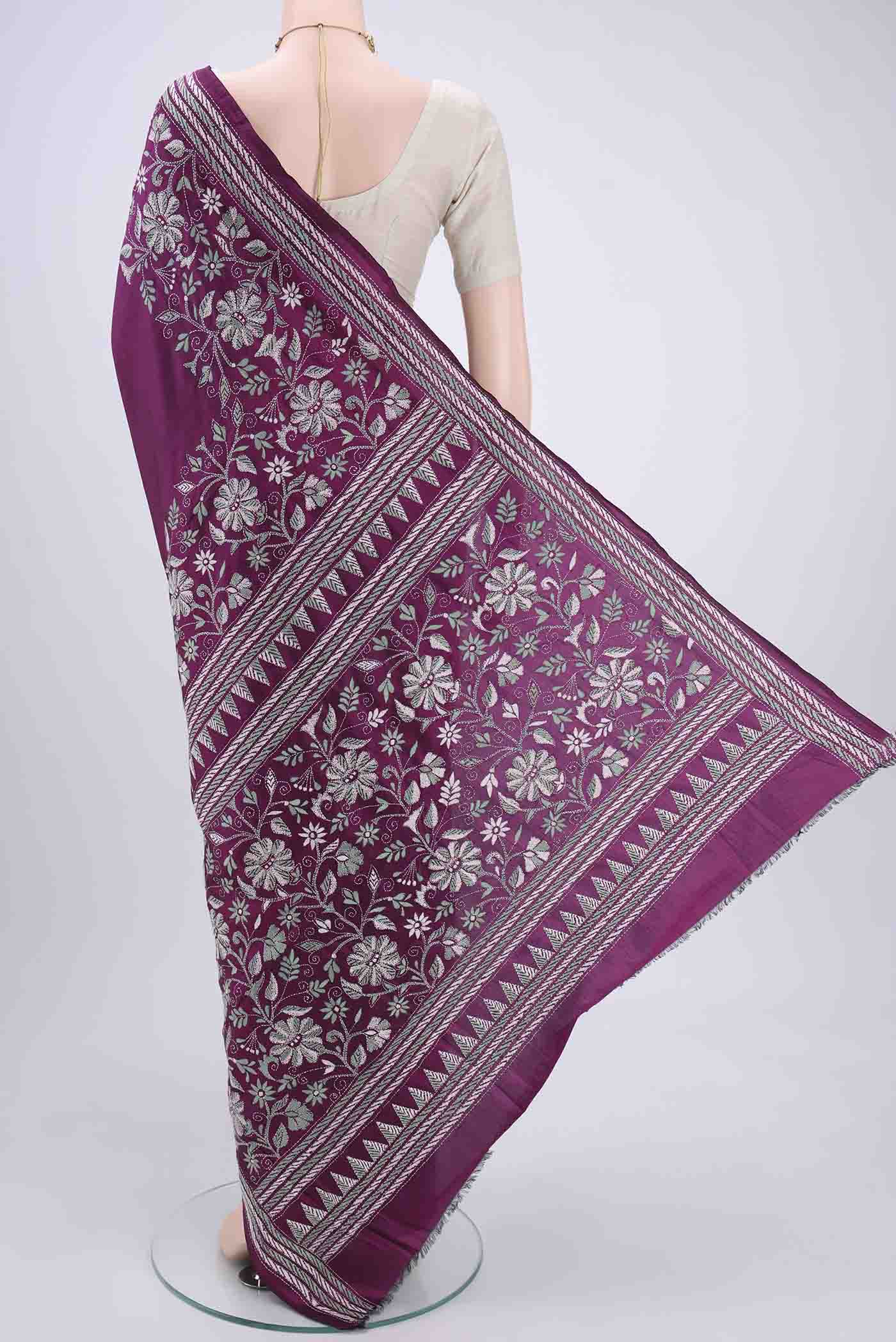 Flat view of Magenta Kantha Silk Saree with Kantha Work on the body and Thread Border. 