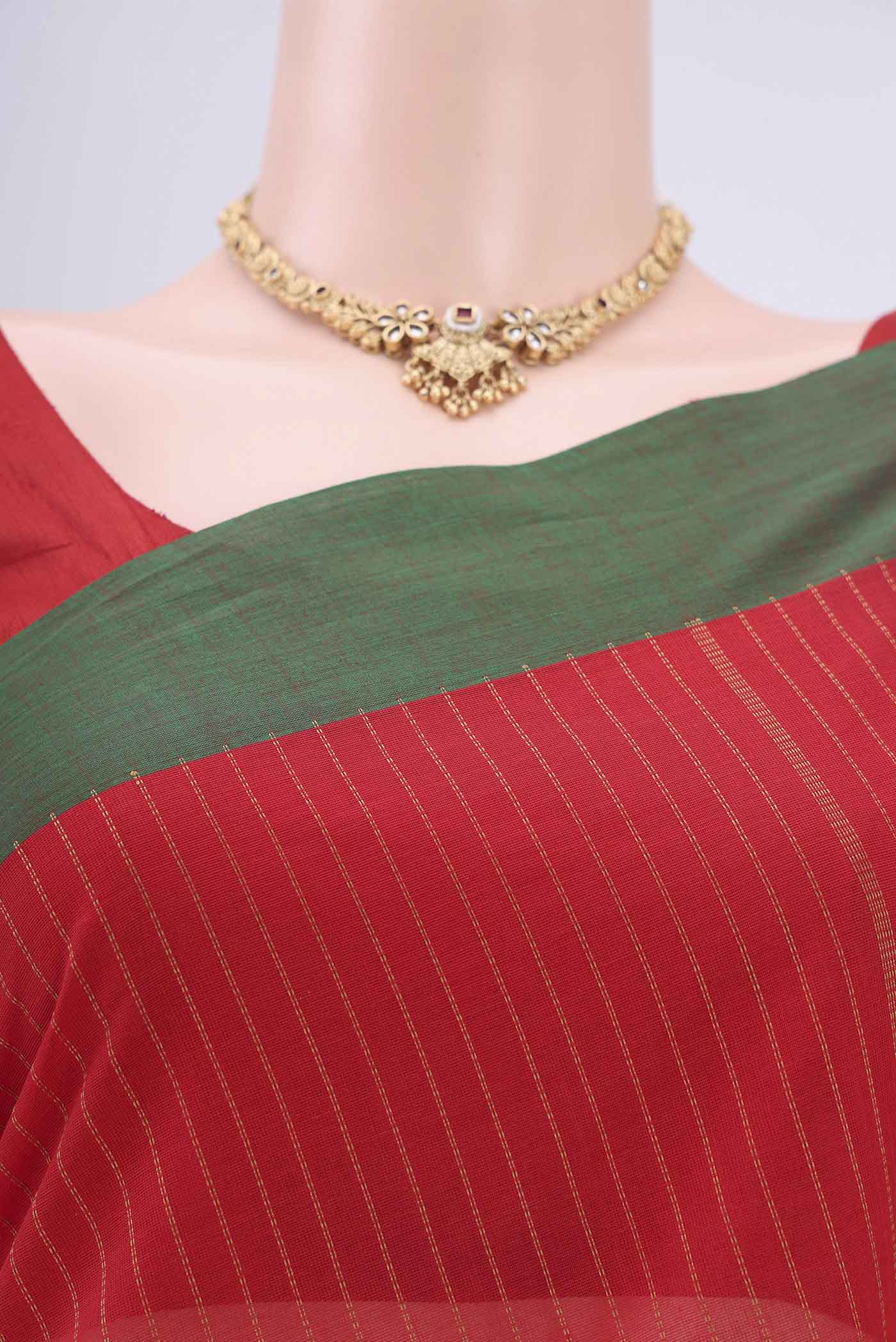 Border image of Red Coimbatore Cotton Saree with Stripes on the body and Zari Border. 