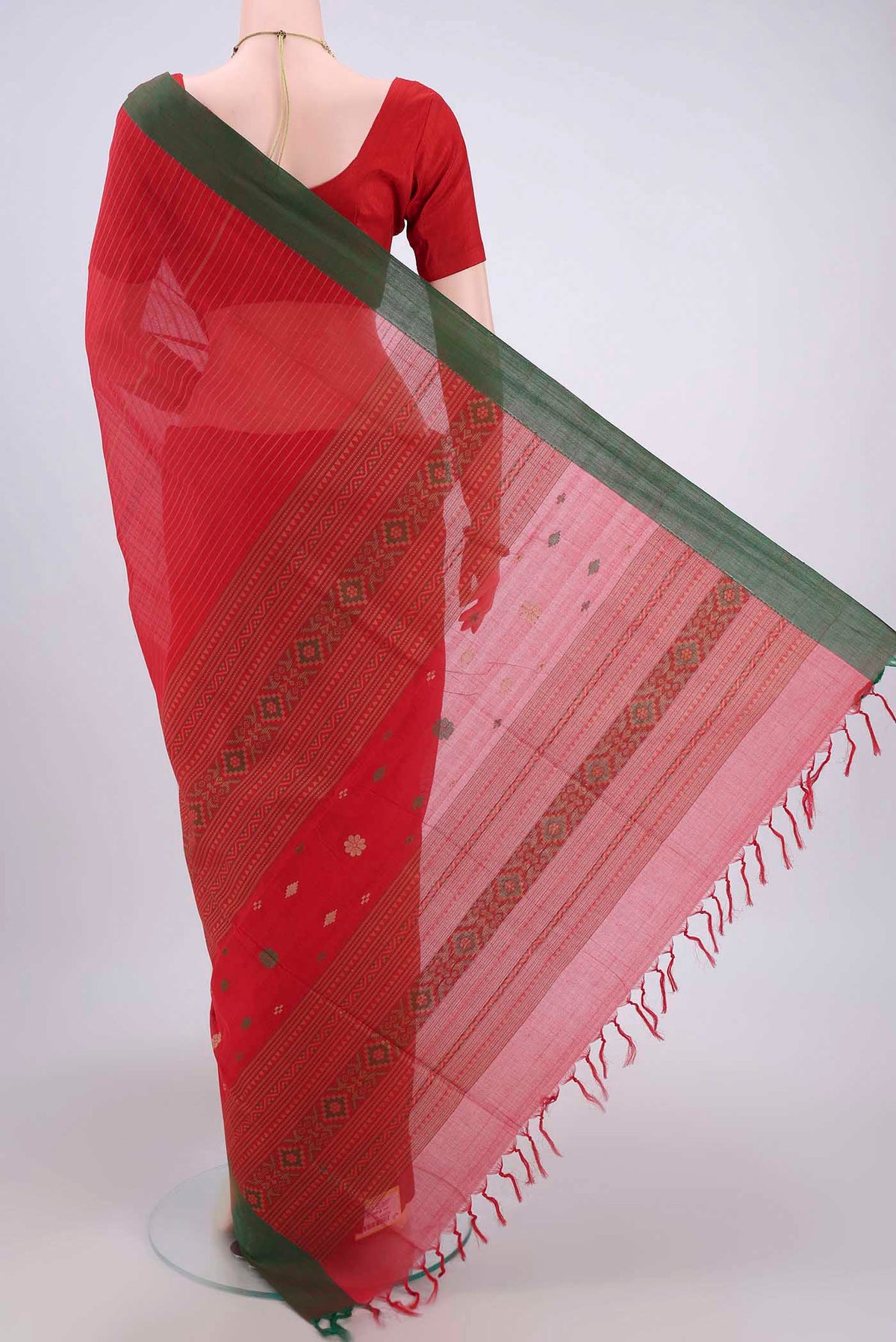 Flat view of Red Coimbatore Cotton Saree with Stripes on the body and Zari Border. 