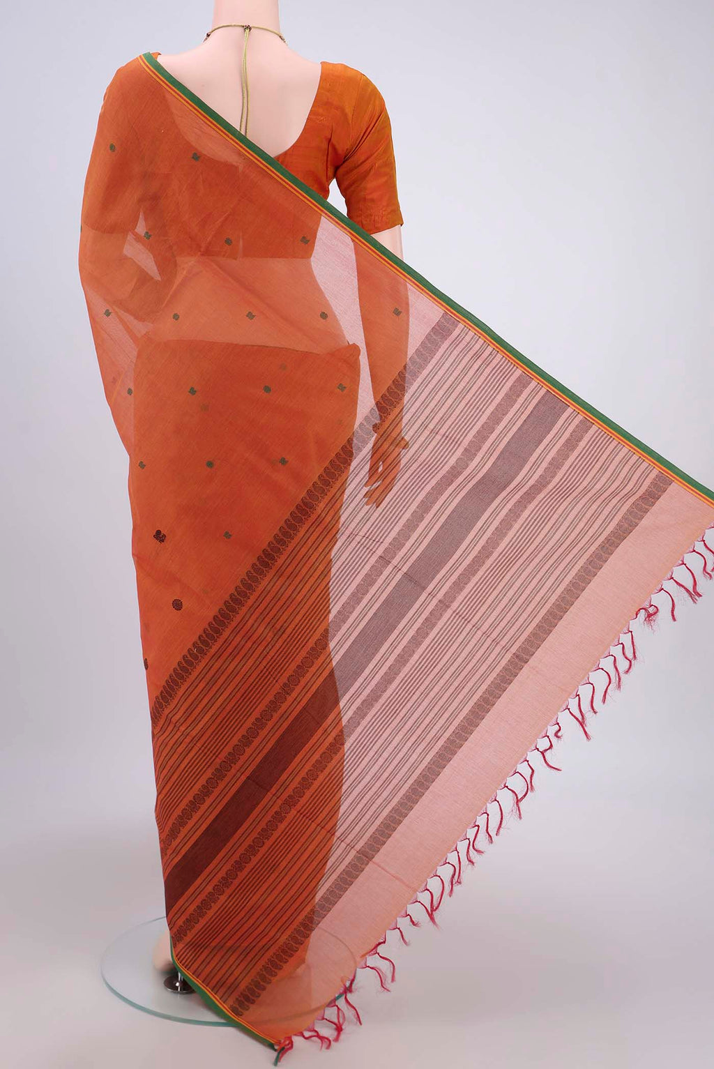 Flat view of Mustard Coimbatore Cotton Saree with Thread Butta on the body and Zari Border. 