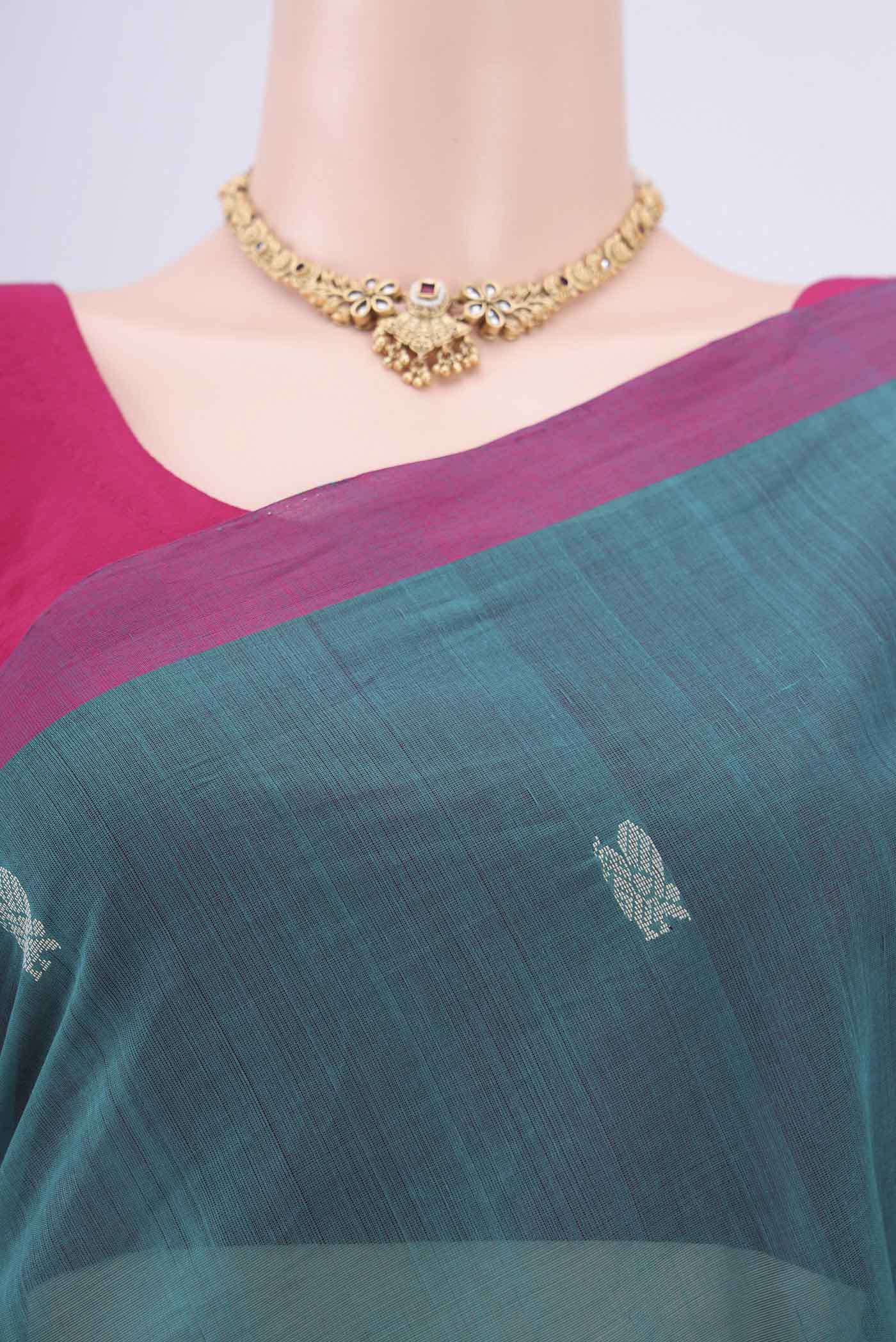 Border image of Sea Green Coimbatore Cotton Saree with Thread Butta on the body and Zari Border. 