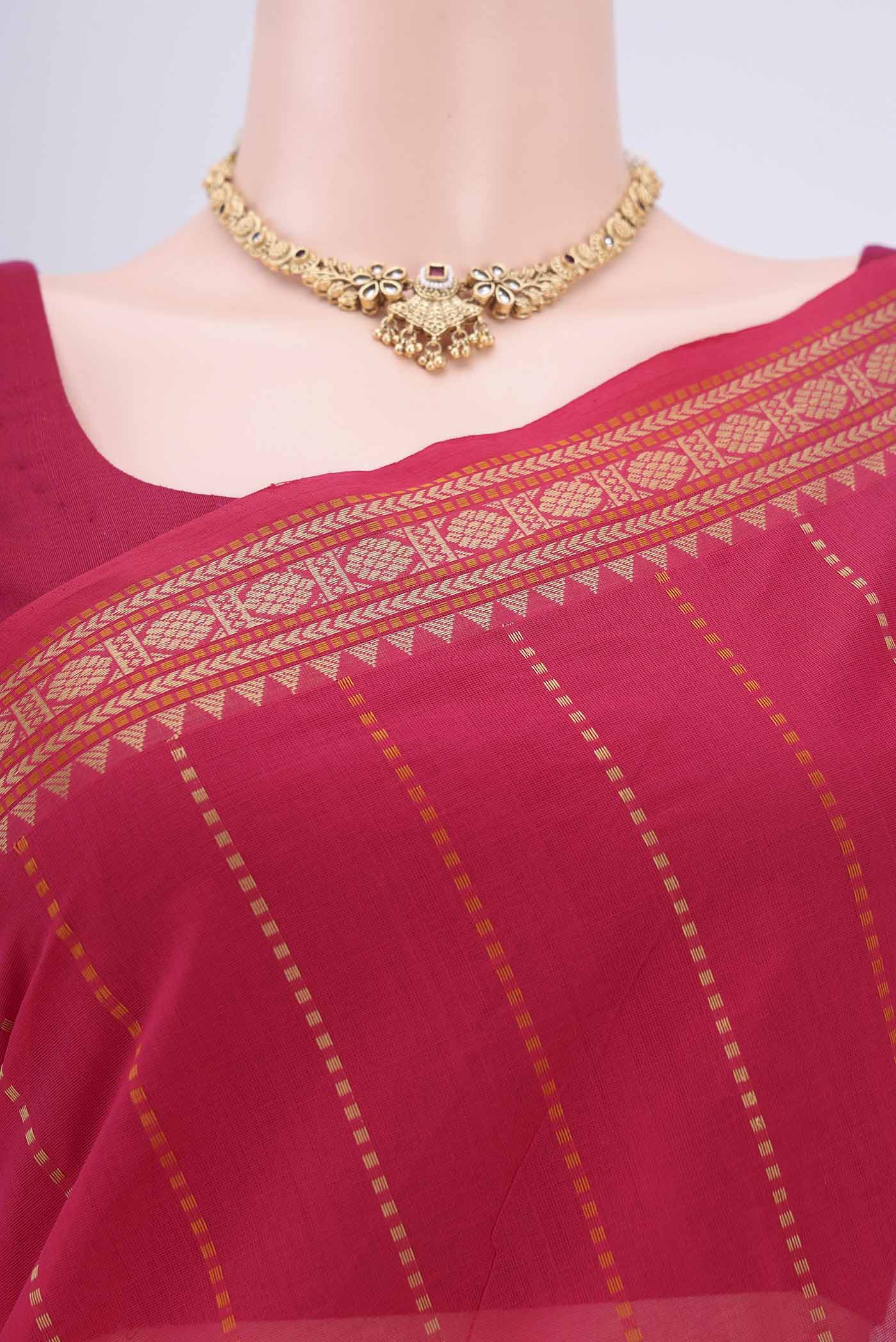 Border image of Dark Pink Kanchi Cotton Saree with Stripes on the body and Zari Border. 