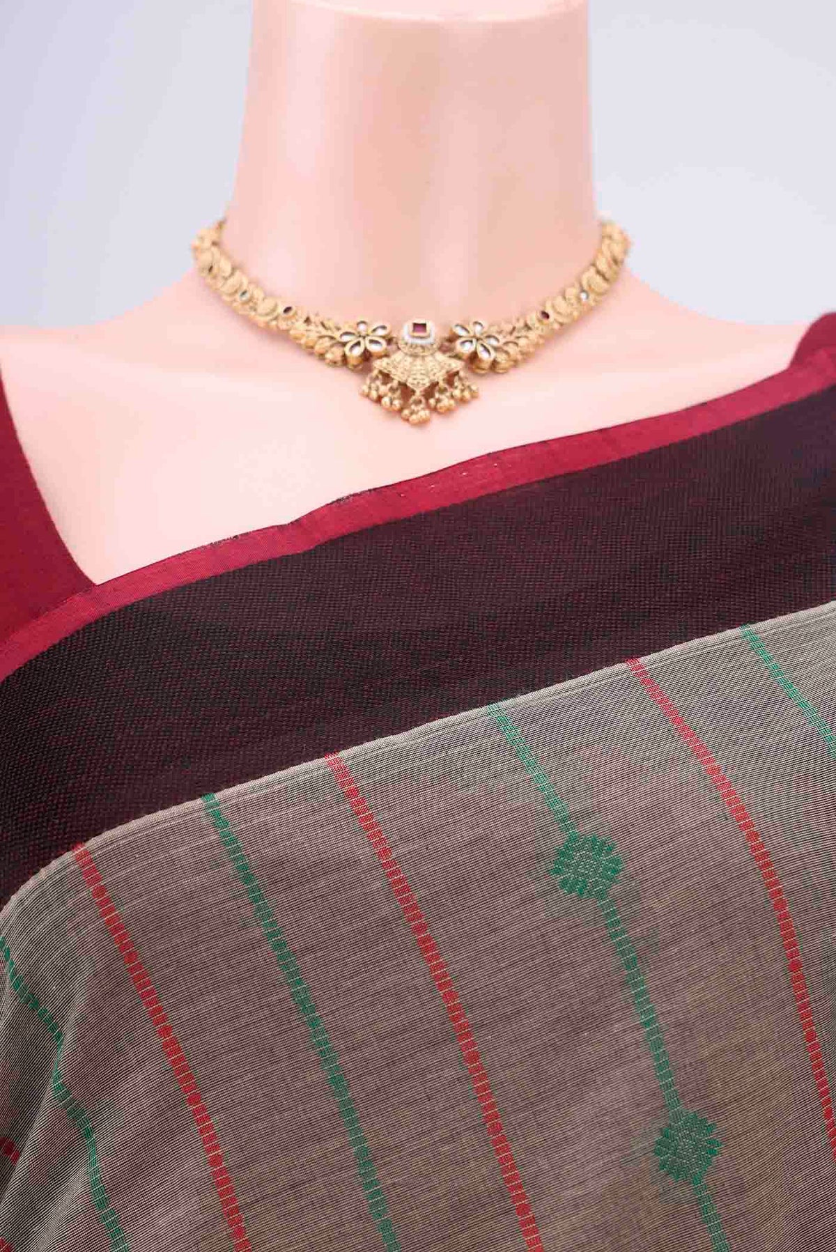 Border image of Grey Coimbatore Cotton Saree with Stripes on the body and Zari Border. 