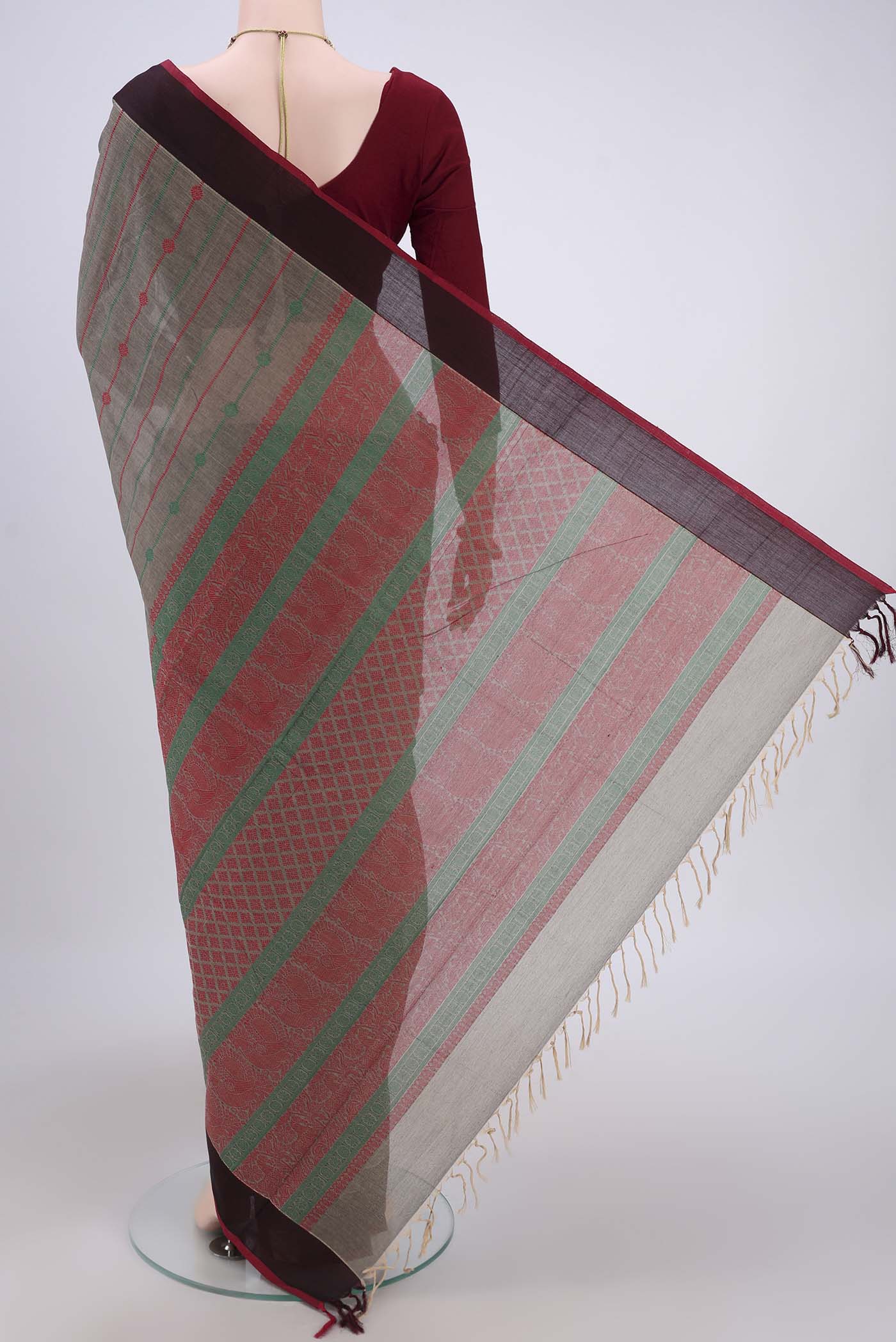 Flat view of Grey Coimbatore Cotton Saree with Stripes on the body and Zari Border. 
