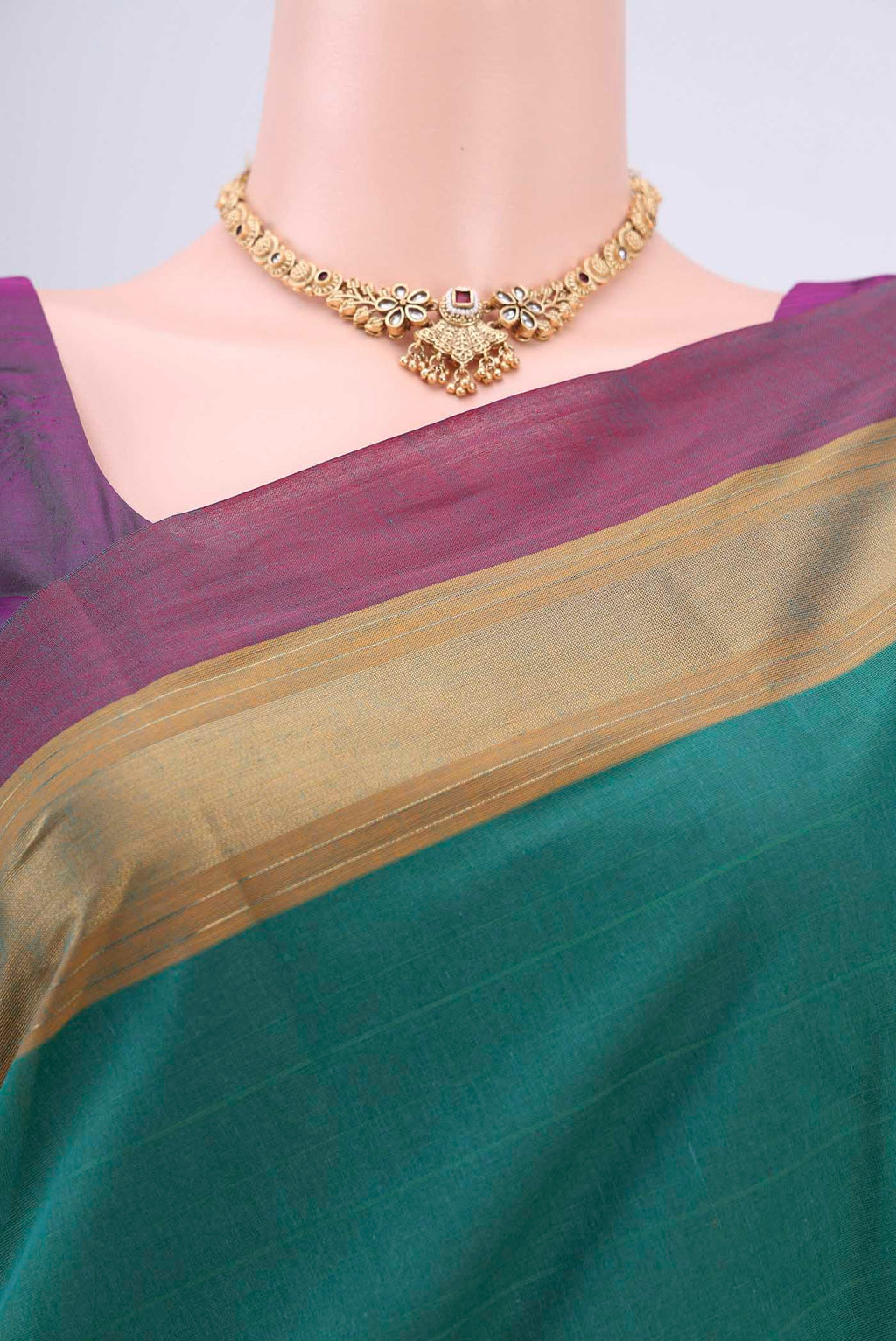 Border image of Green Kanchi Cotton Saree with Thread Butta on the body and Zari Border. 