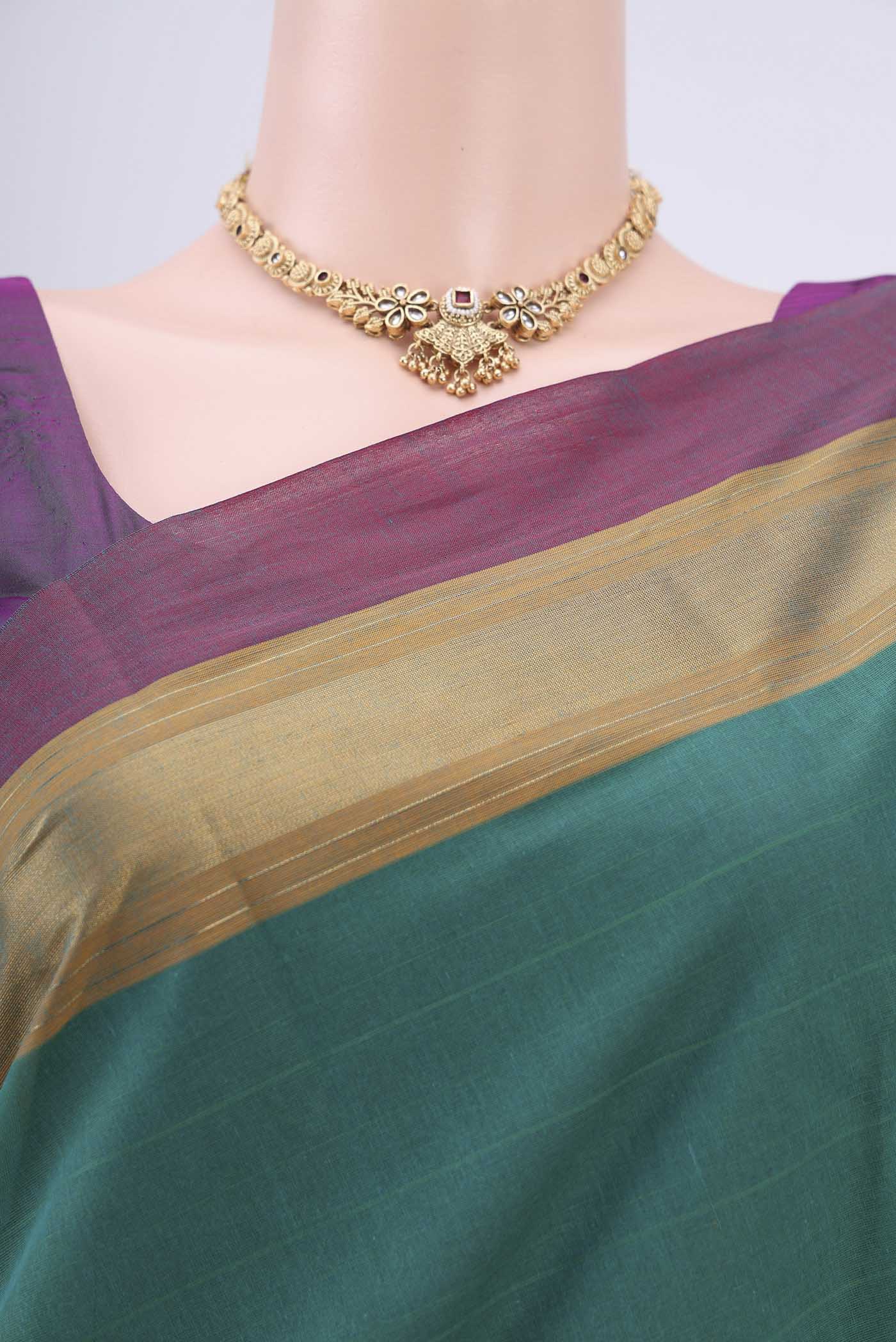 Border image of Green Kanchi Cotton Saree with Thread Butta on the body and Zari Border. 