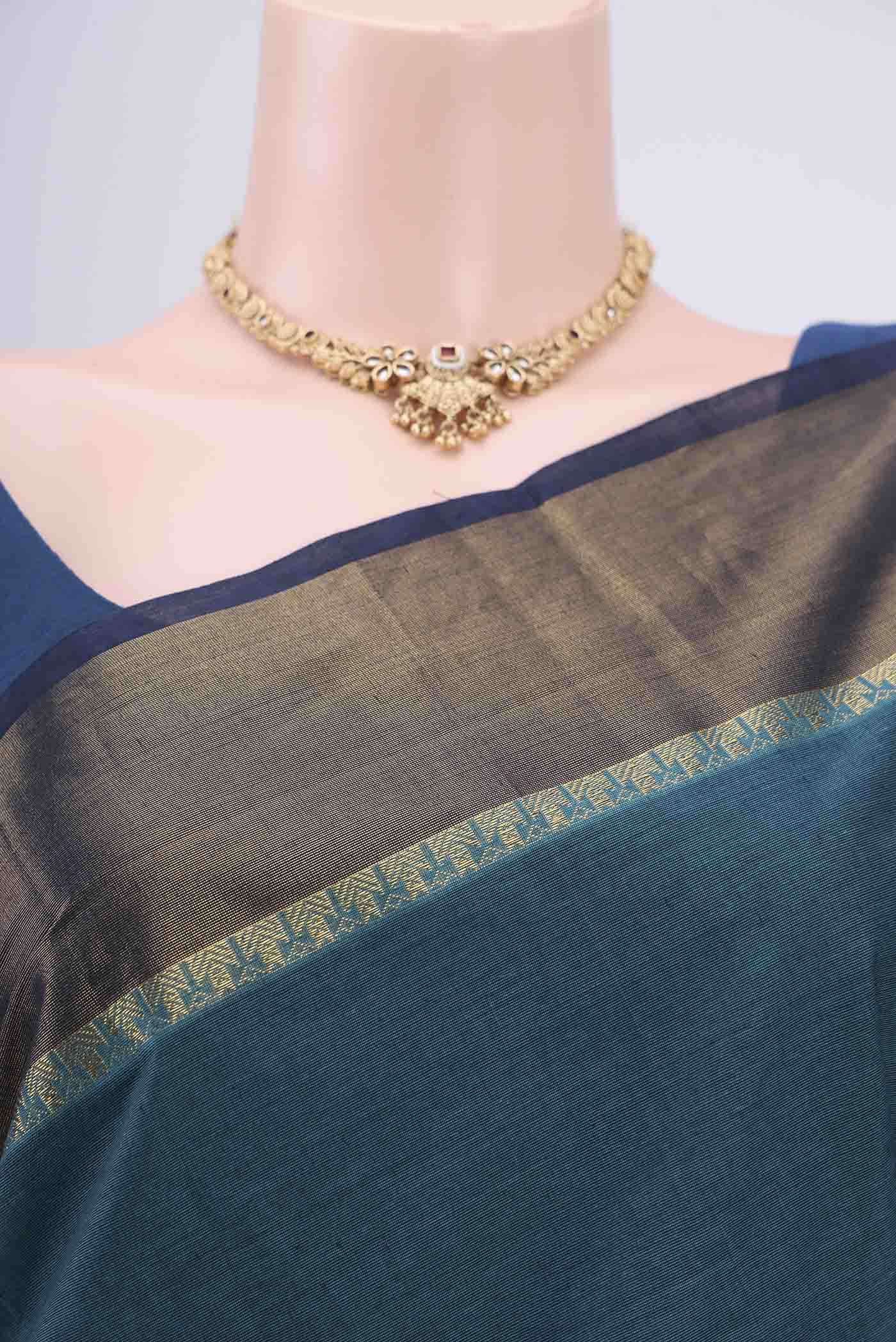 Border image of Blue Kanchi Cotton Saree with Thread Butta on the body and Zari Border. 