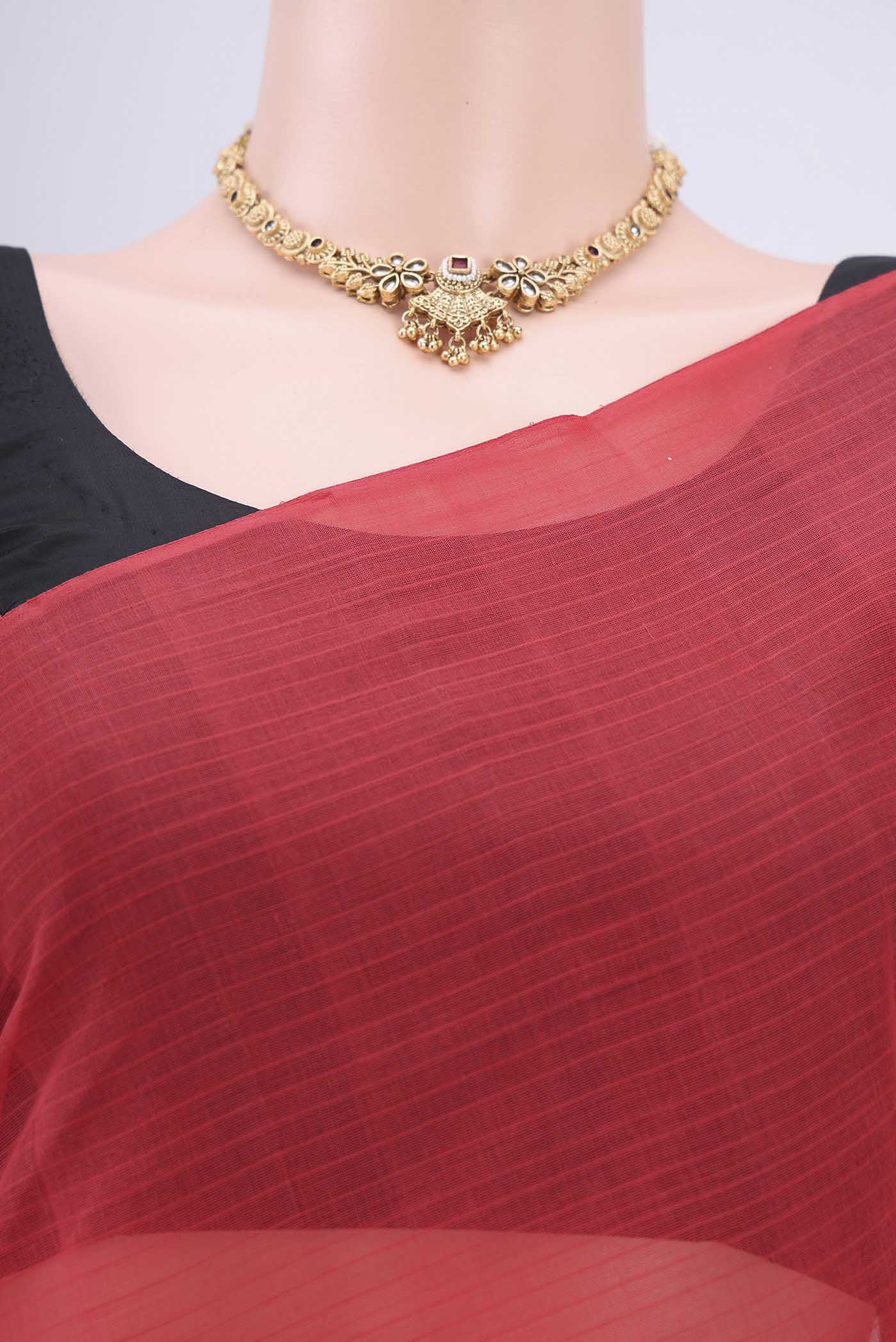 Border image of Peach Kanchi Cotton Saree with Plain Body and Zari Border. 