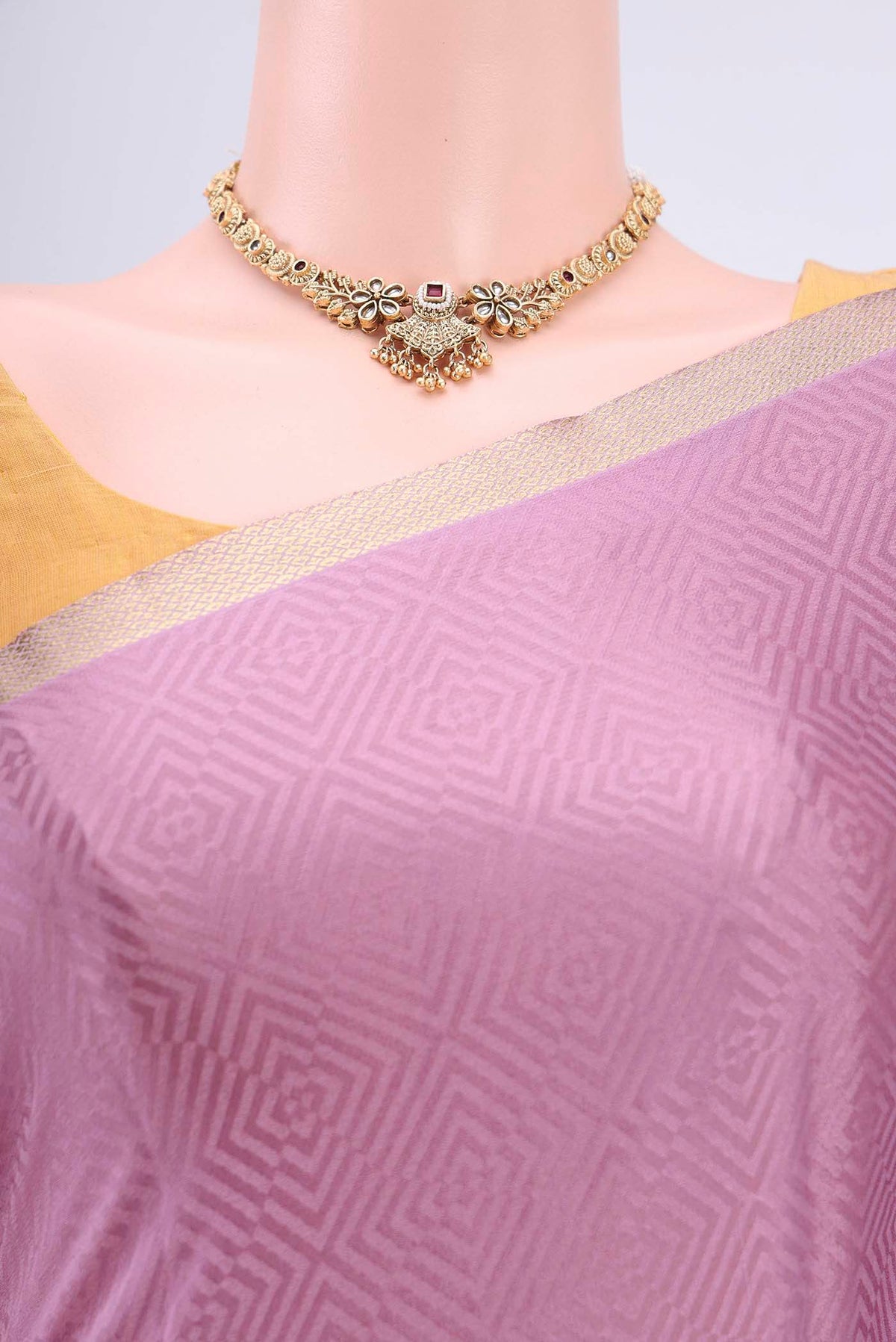 Border image of Mauve Mysore Crepe Saree with Jacquard design on the body and Zari Border. 