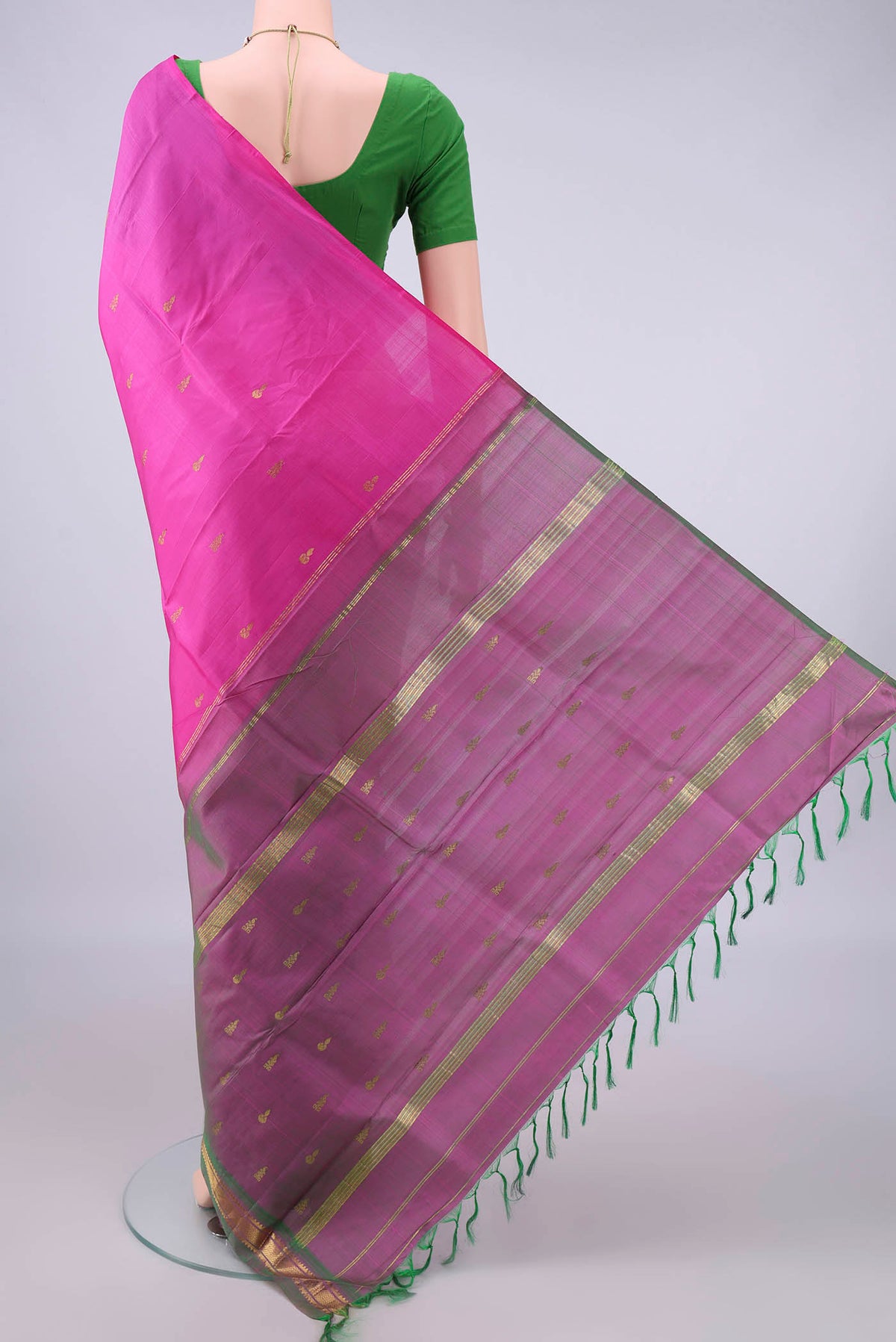 Flat view of Pure Silk Pink Kanchipuram Saree with Zari Butta on the body and Zari Border. 