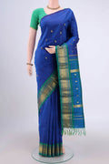 Dark Blue Dual Tone Kanjivaram Silk Saree with Zari Butta on the body and One Side Border.  displayed on a mannequin