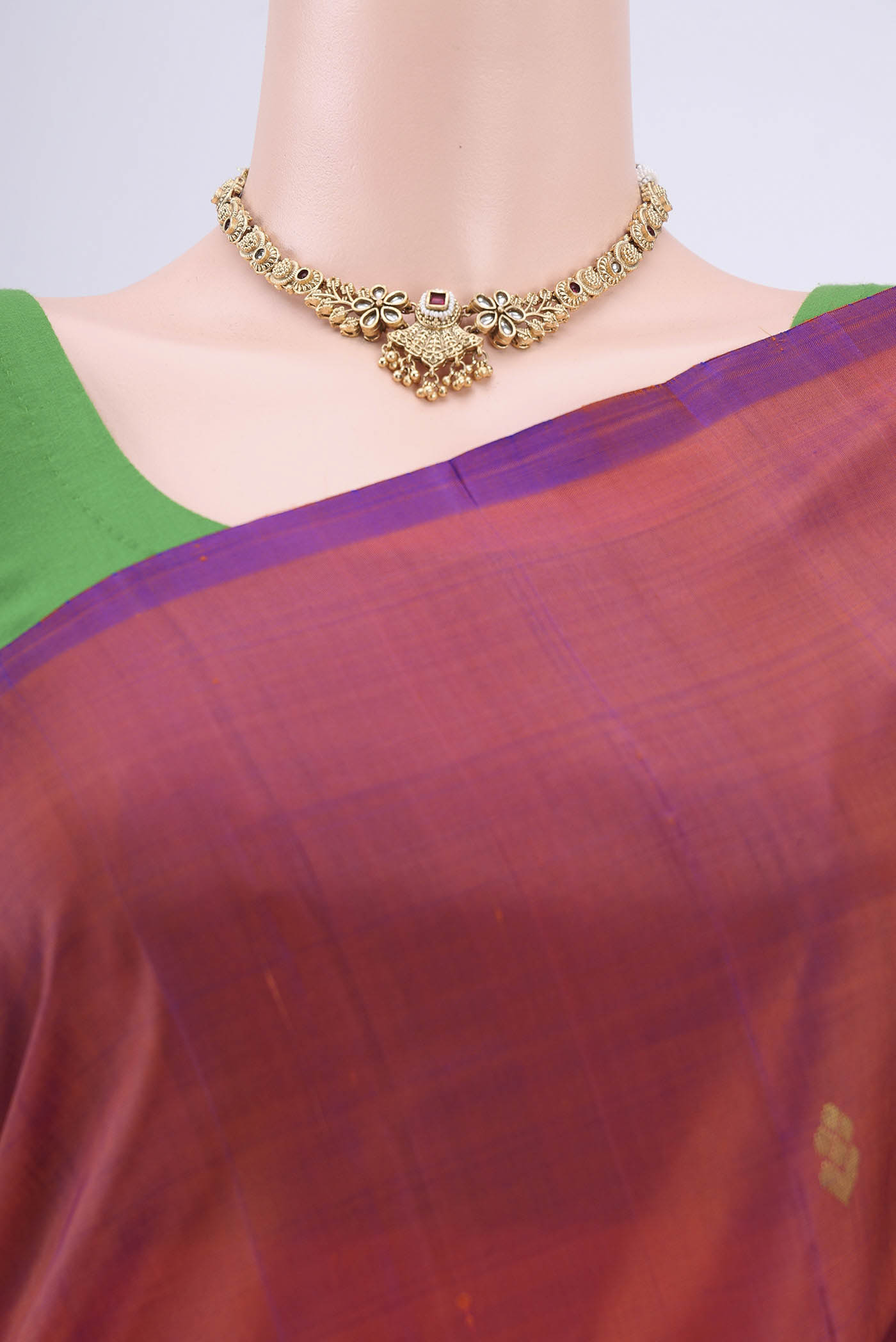 Border image of Rust Dual Tone Kanjivaram Silk Saree with Zari Butta on the body and One Side Border. 
